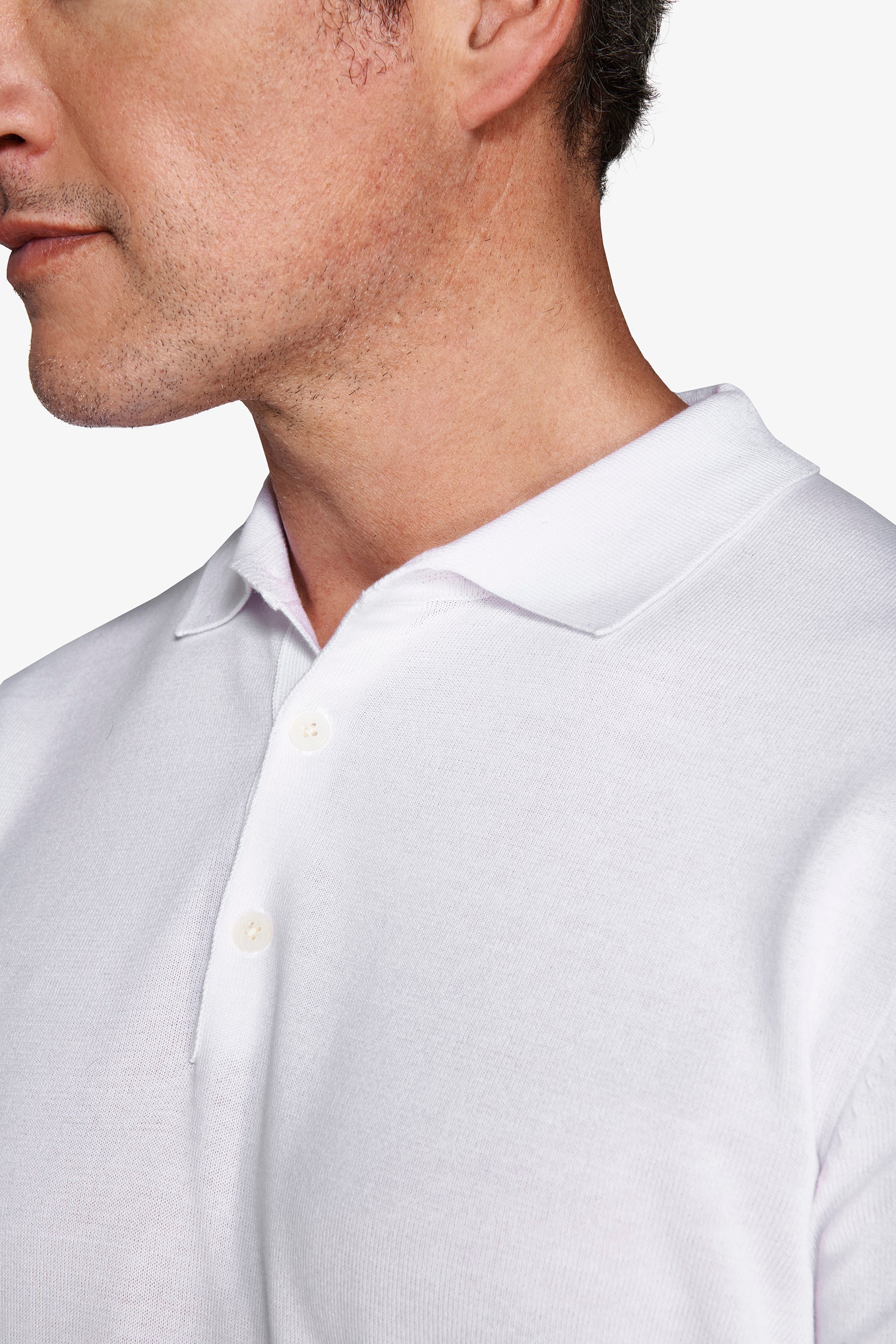Poloshirt aus Strick mit Knöpfen in Off White