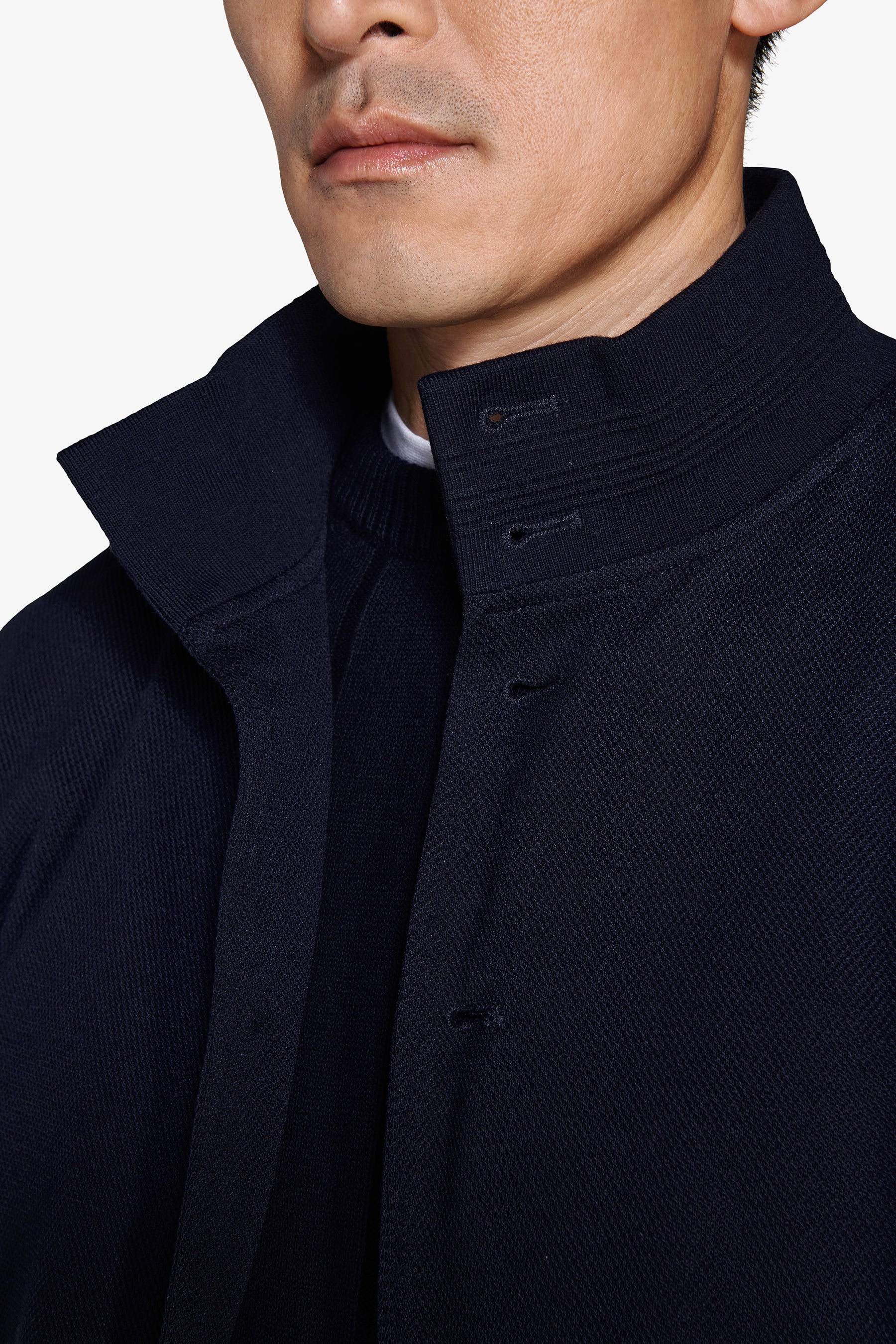 Chaqueta bómber en punto piqué.