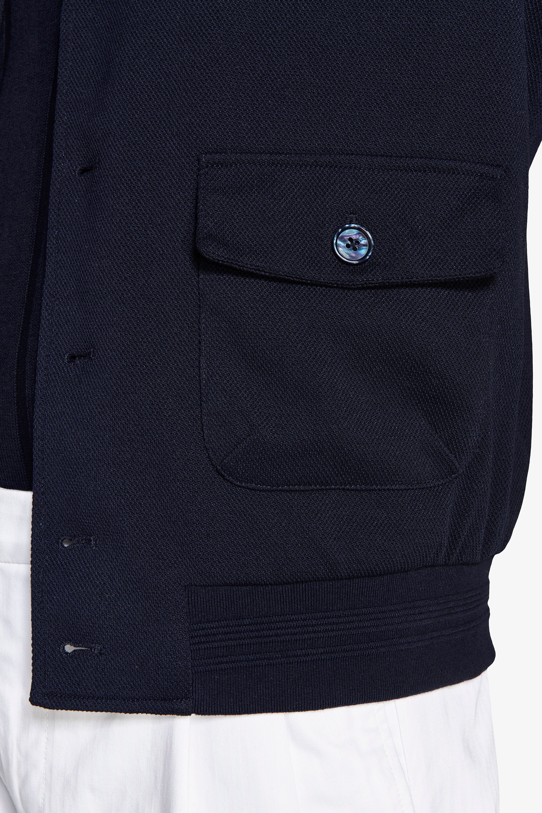 Chaqueta bómber en punto piqué.