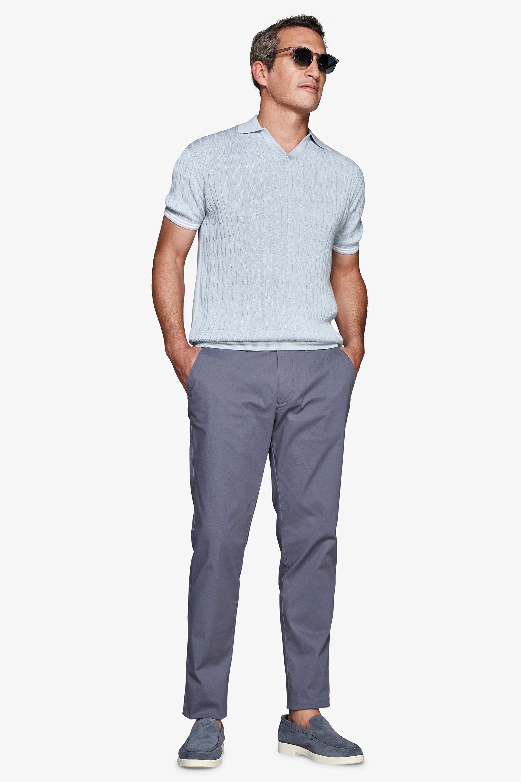 Polo in maglia treccia celeste