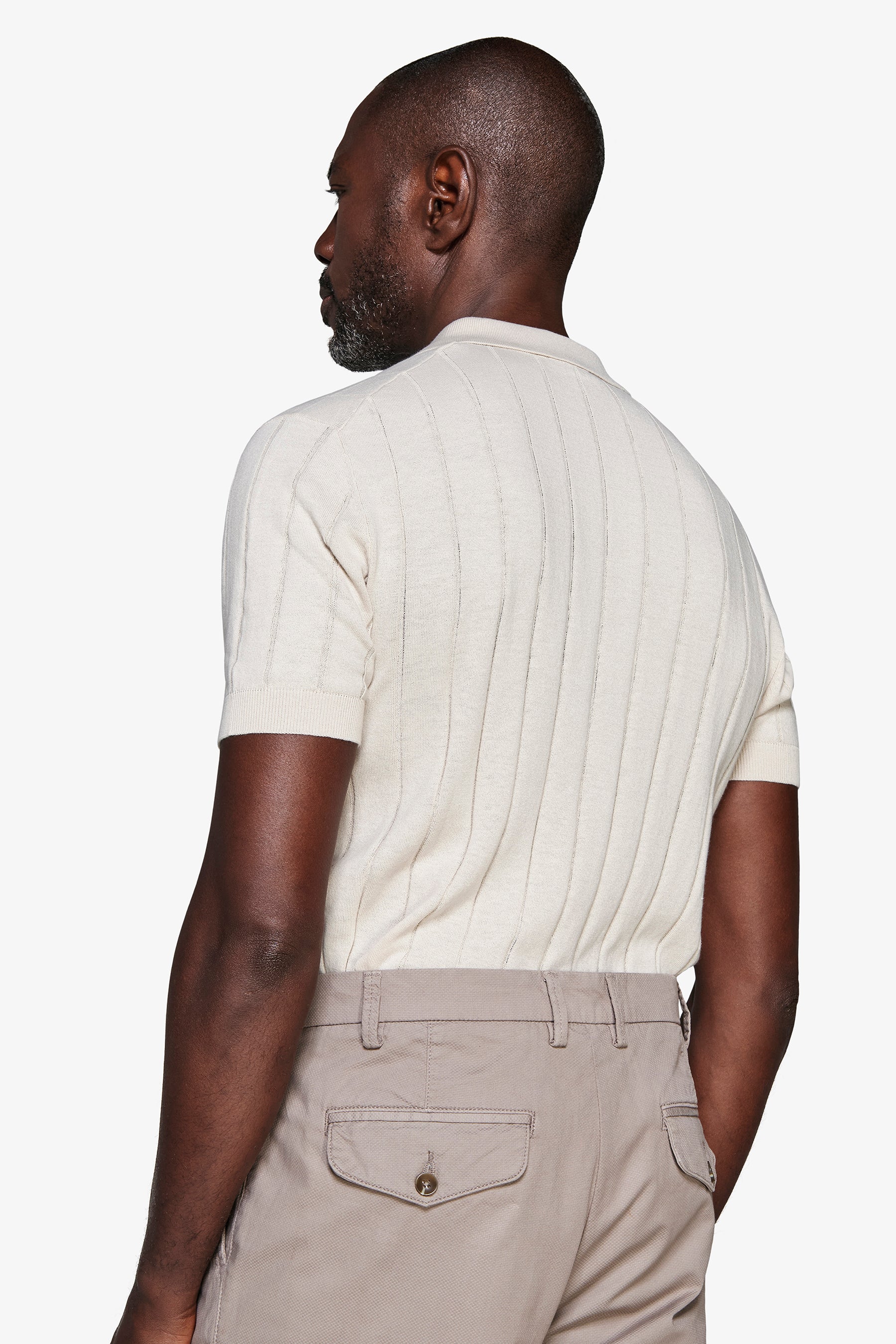 Polo in maglia costa piatta sabbia