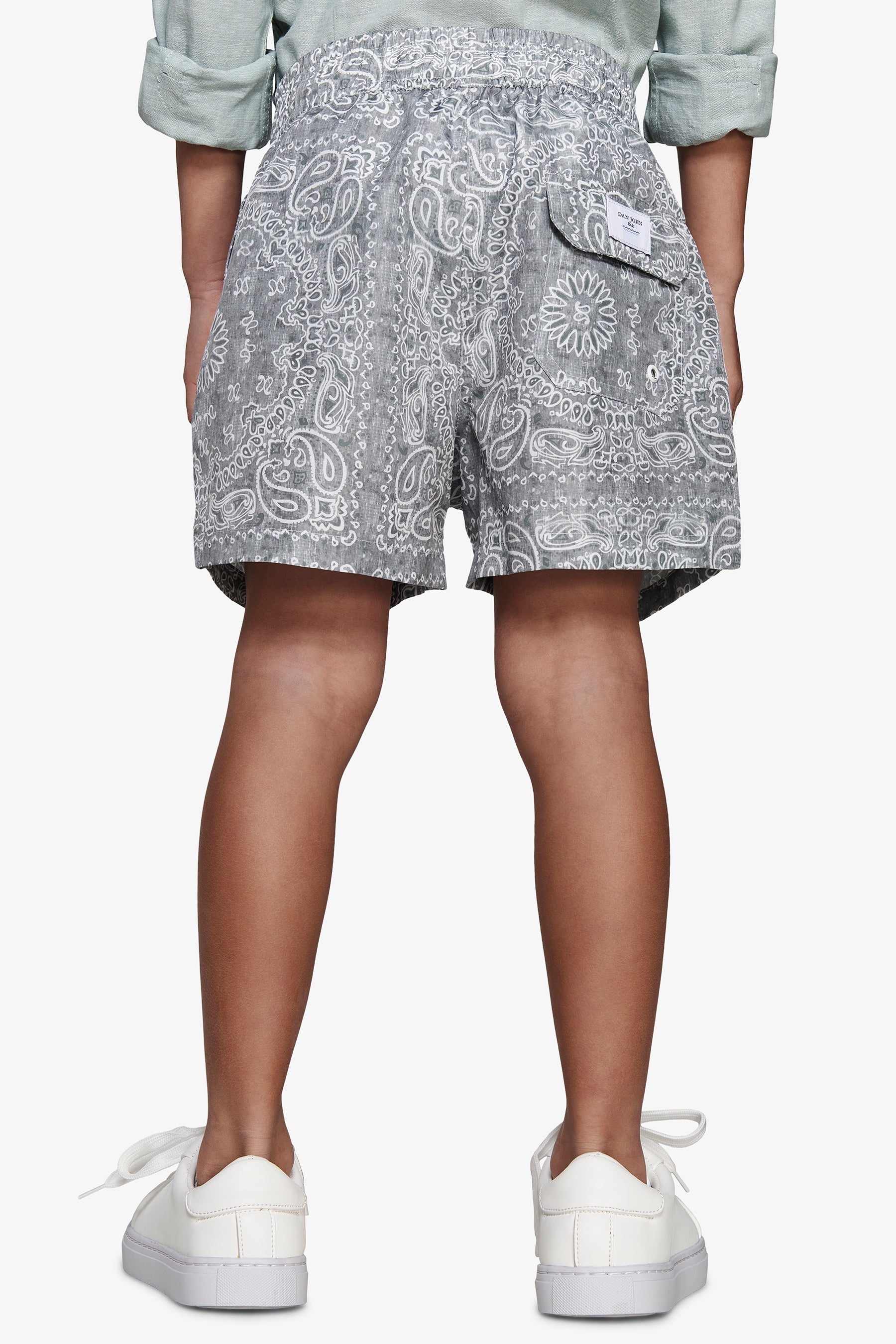 KIDS Sage floral print swim trunks
