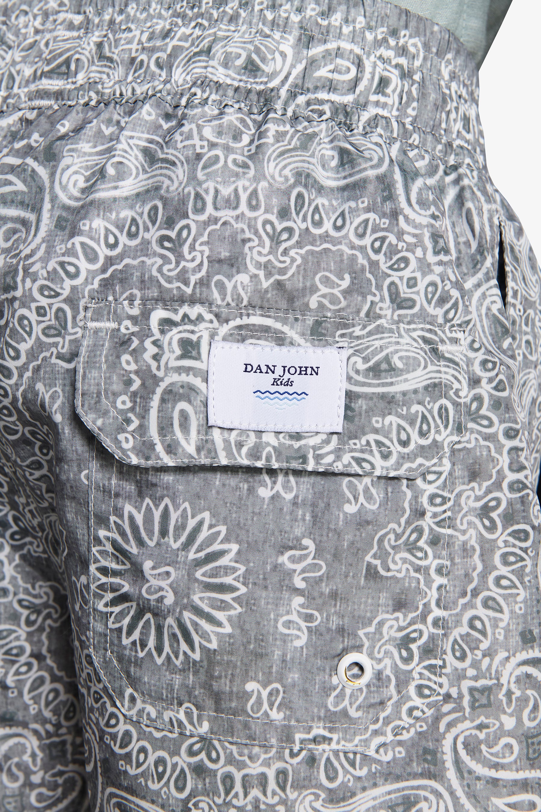 KIDS Sage floral print swim trunks