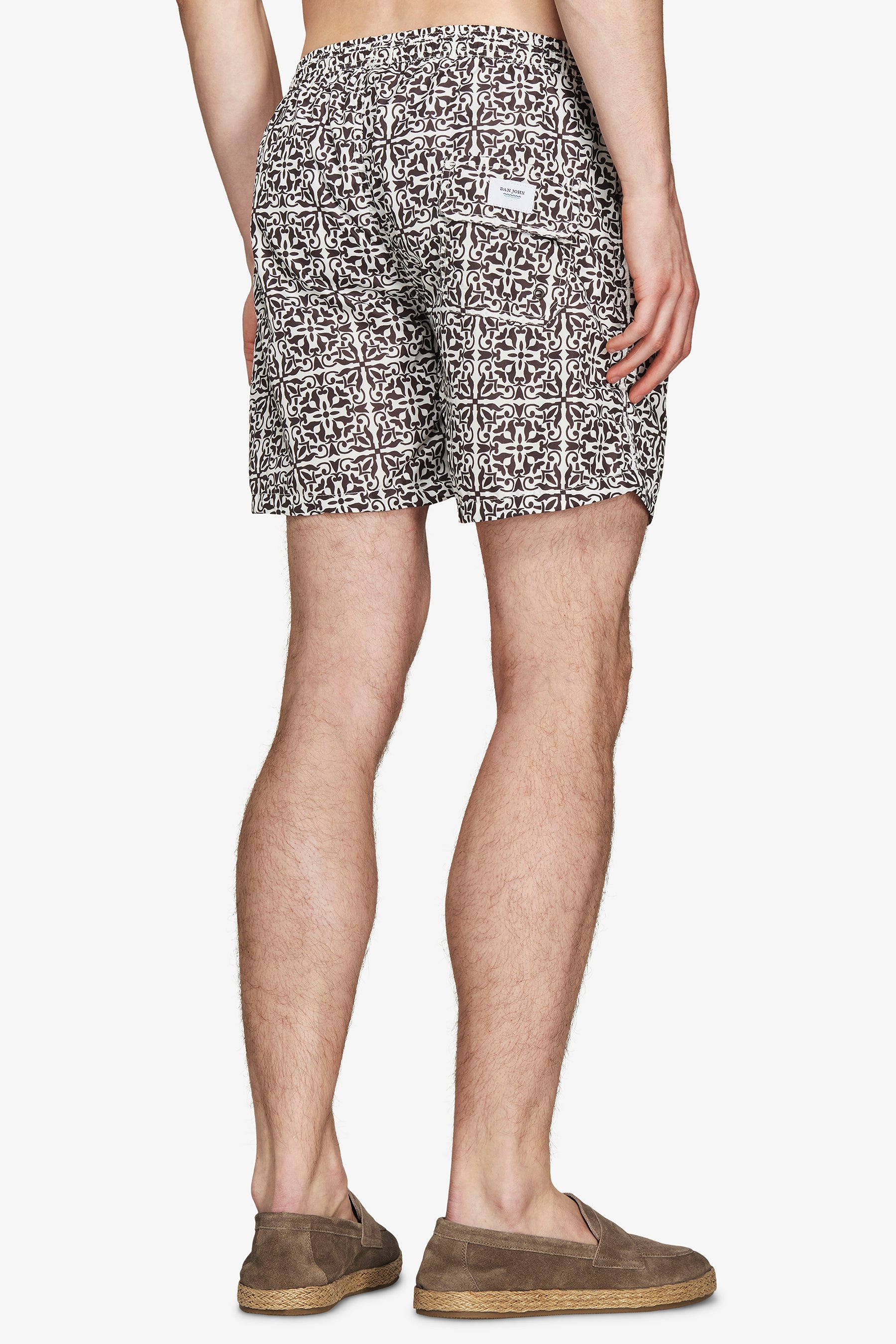 Dark brown ethnic print swim trunks