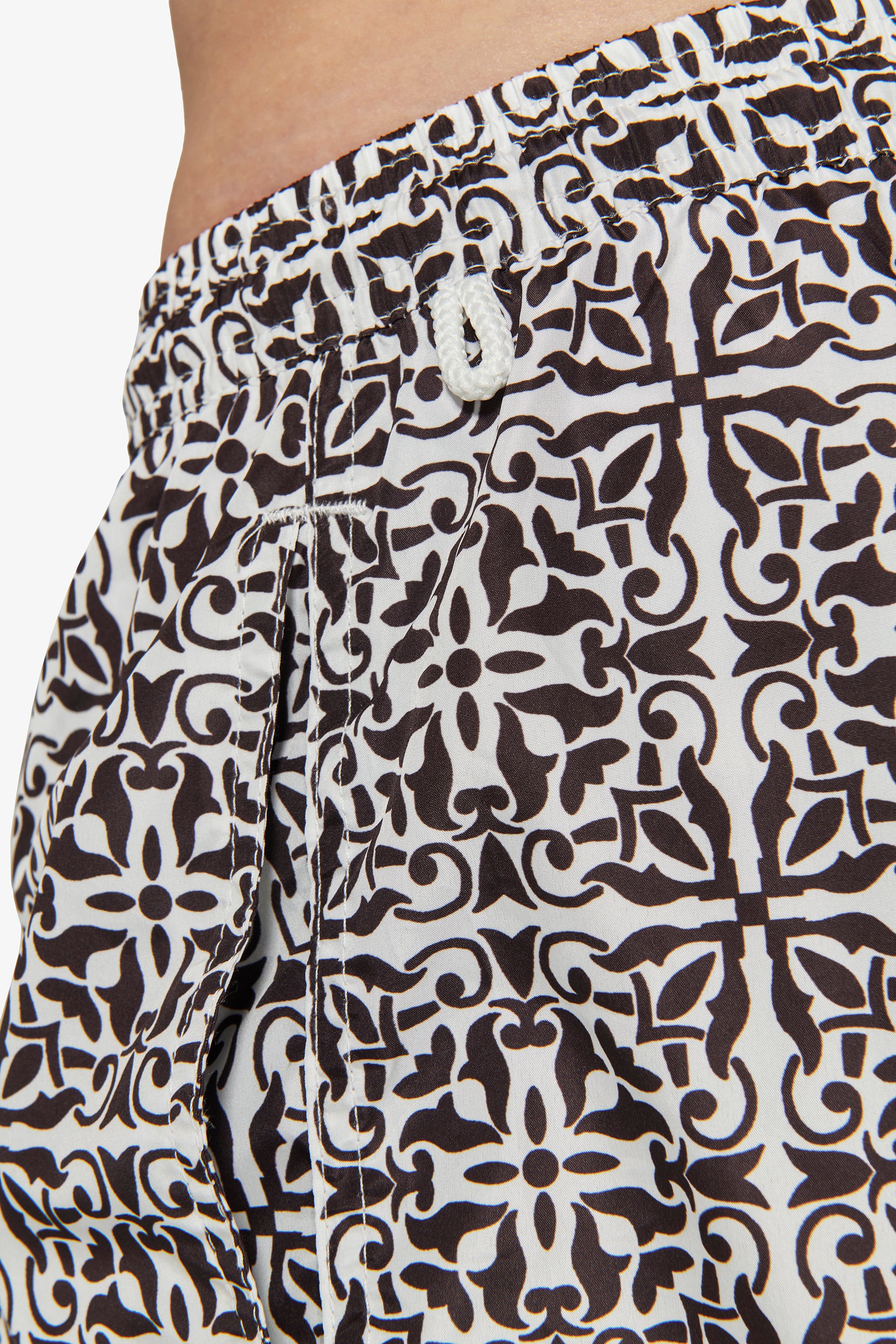Dark brown ethnic print swim trunks