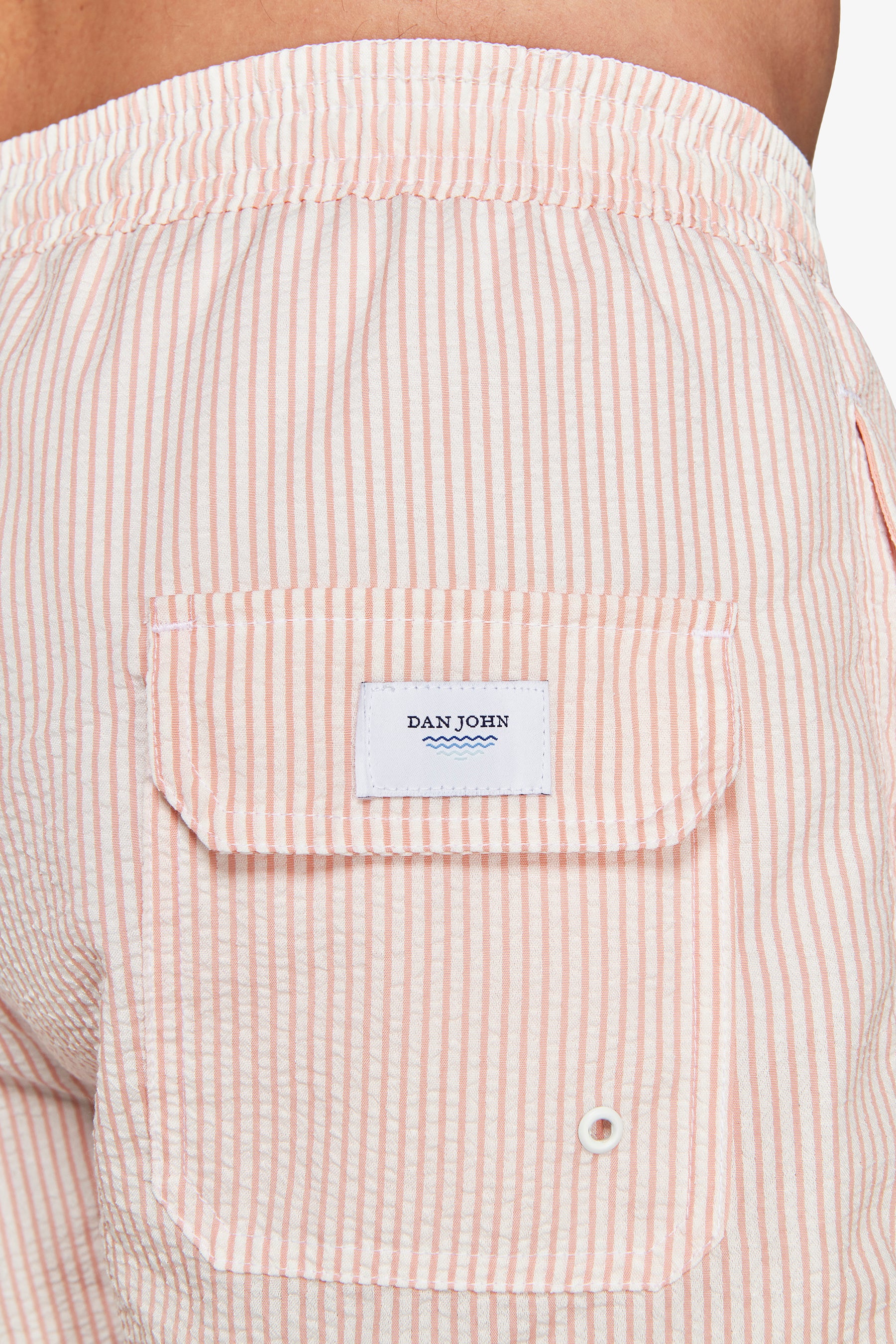 Pink striped seersucker swim trunks