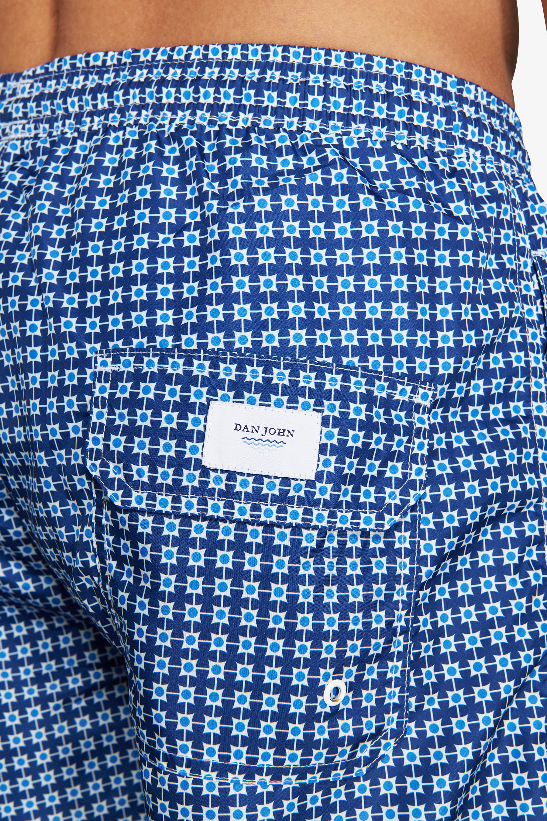 Blue geometric print swim trunks