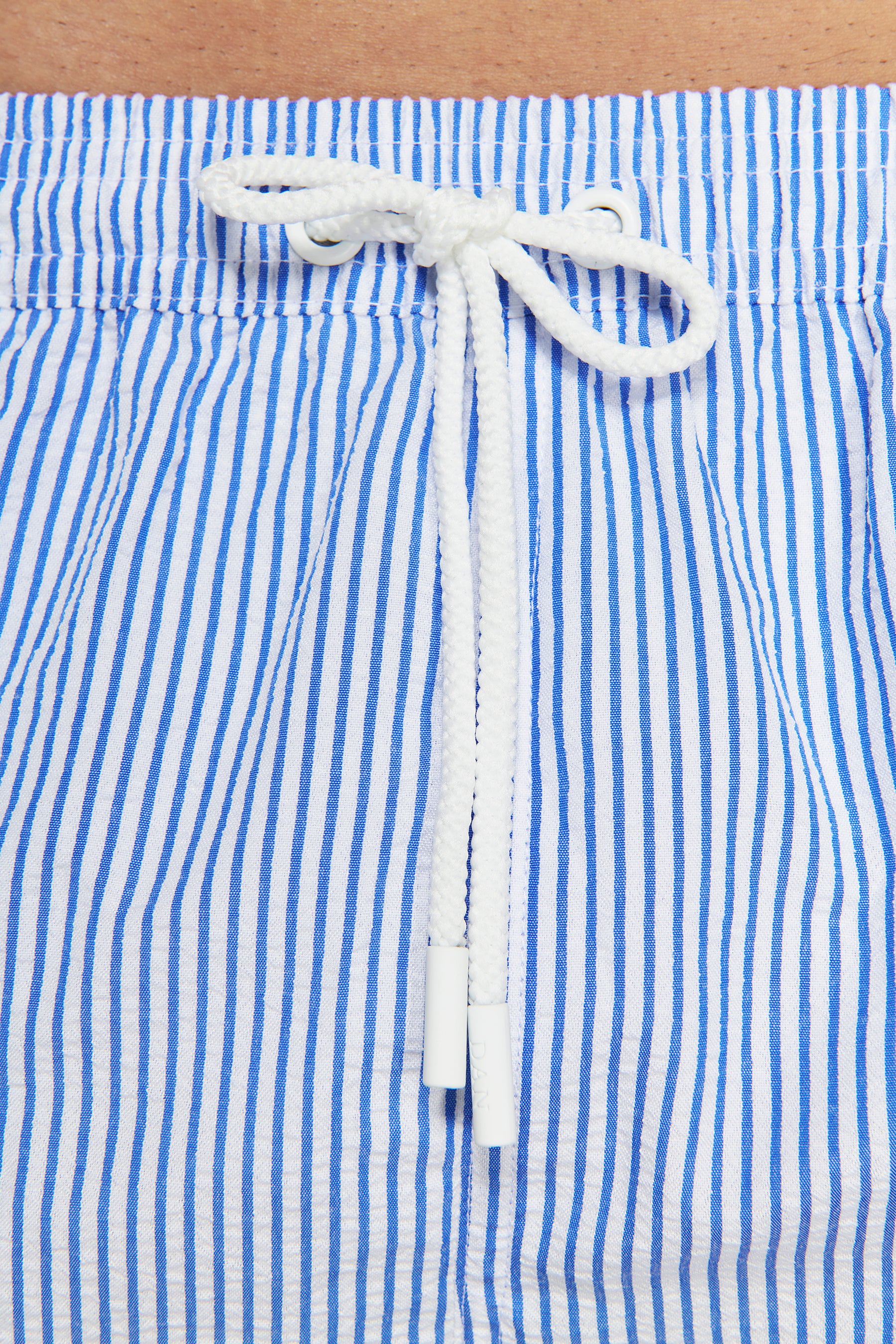 Light blue seersucker striped swim trunks