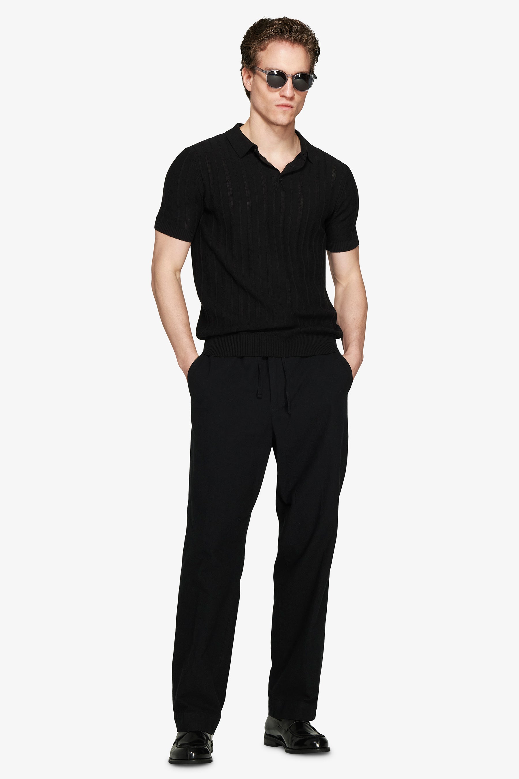 Polo in maglia traforata nera-Dan John