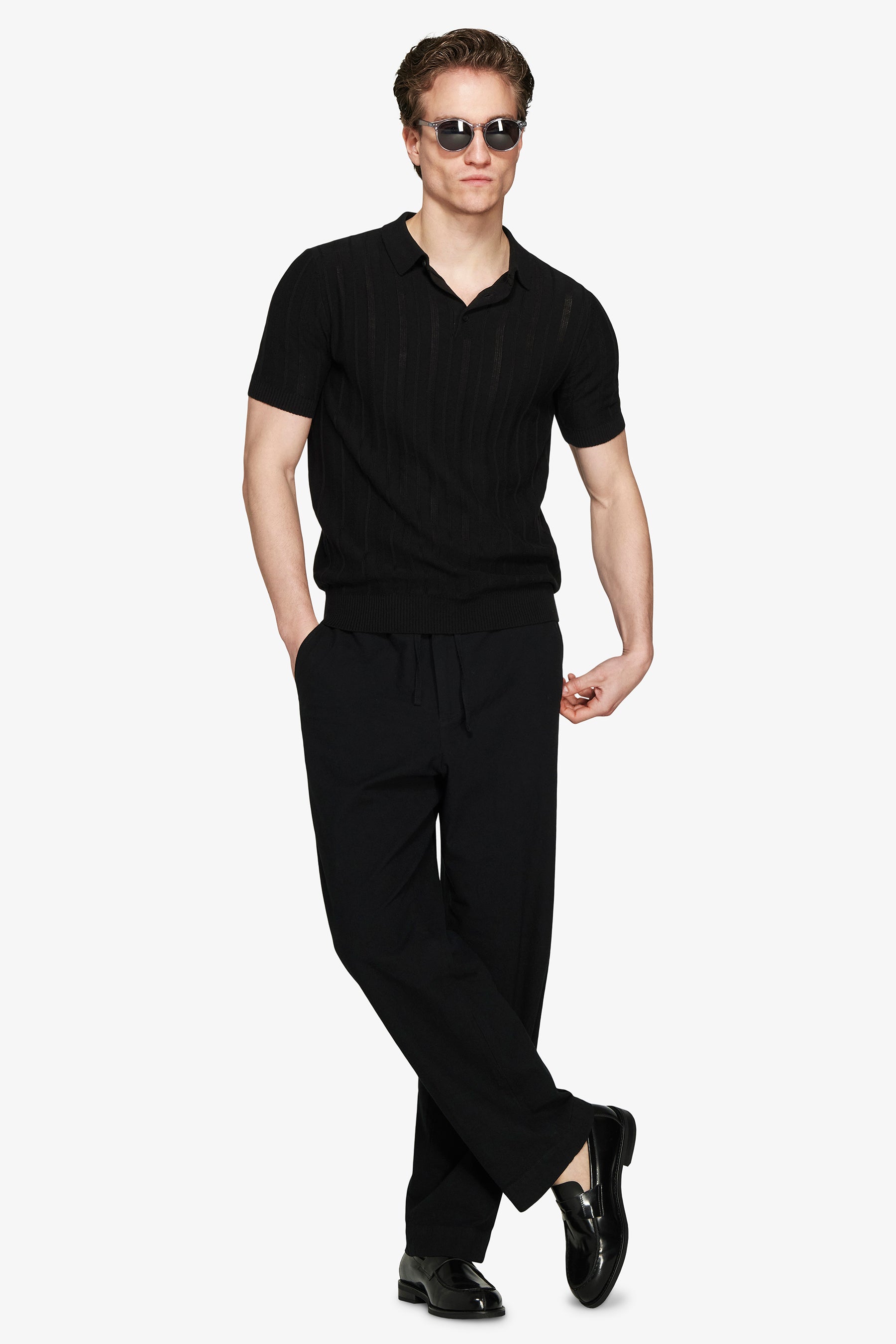 Polo in maglia traforata nera-Dan John