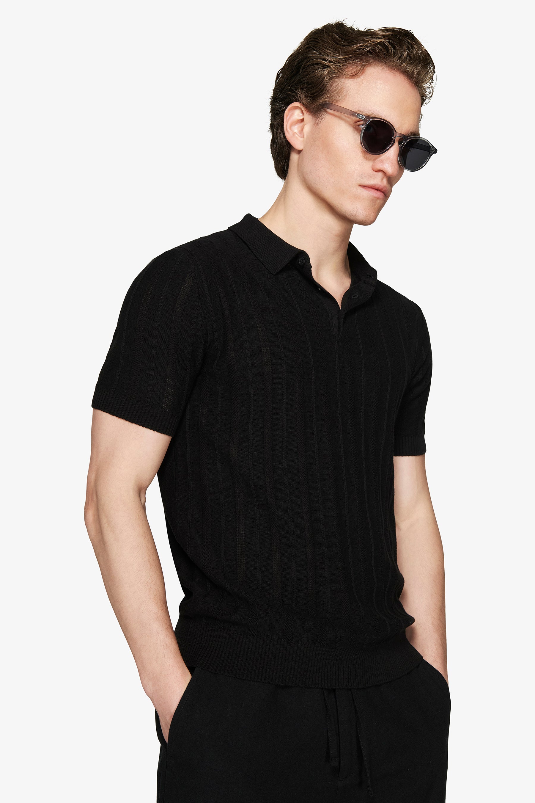 Polo in maglia traforata nera-Dan John