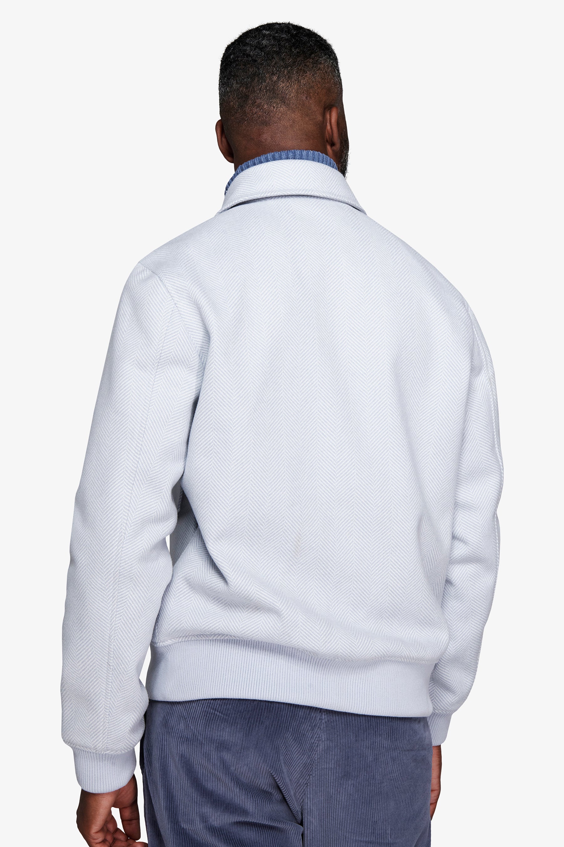 Bomber effetto flanella spigata celeste