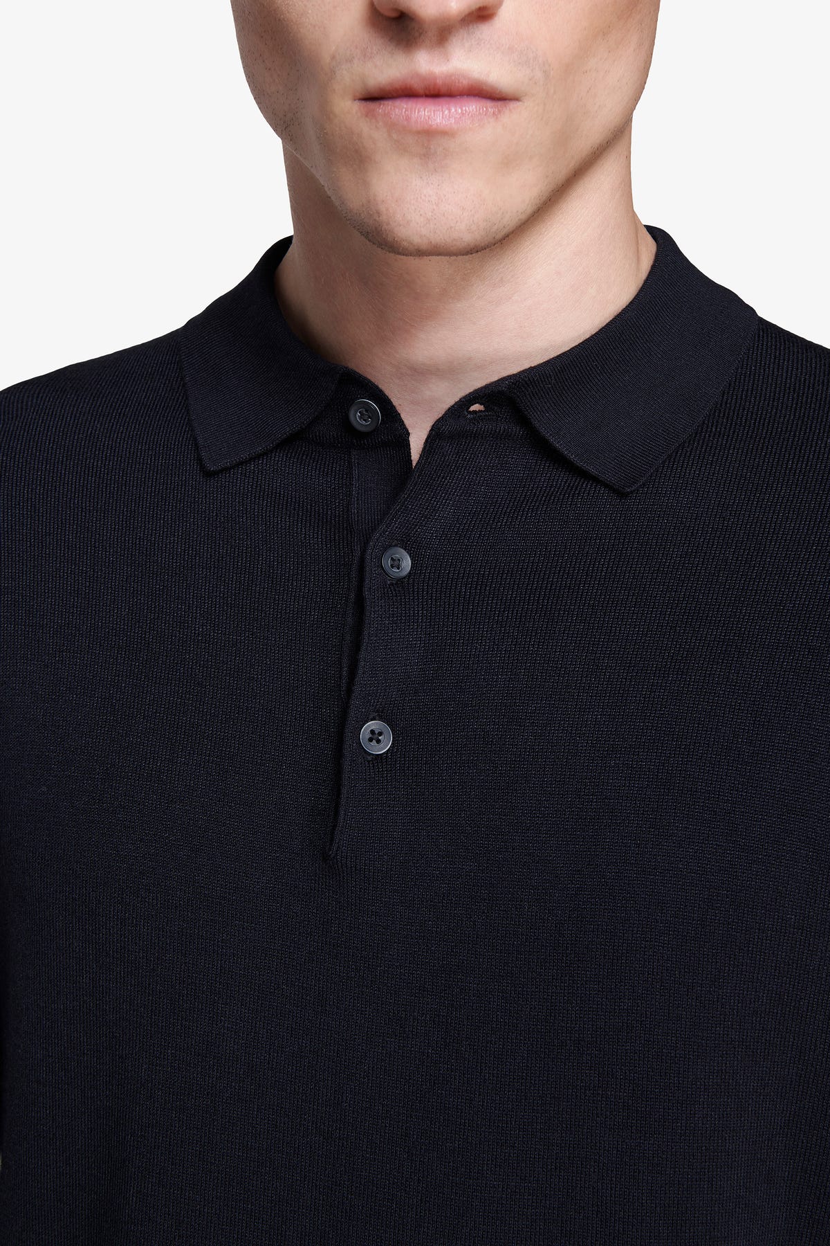 Polo in maglia con bottoni blu