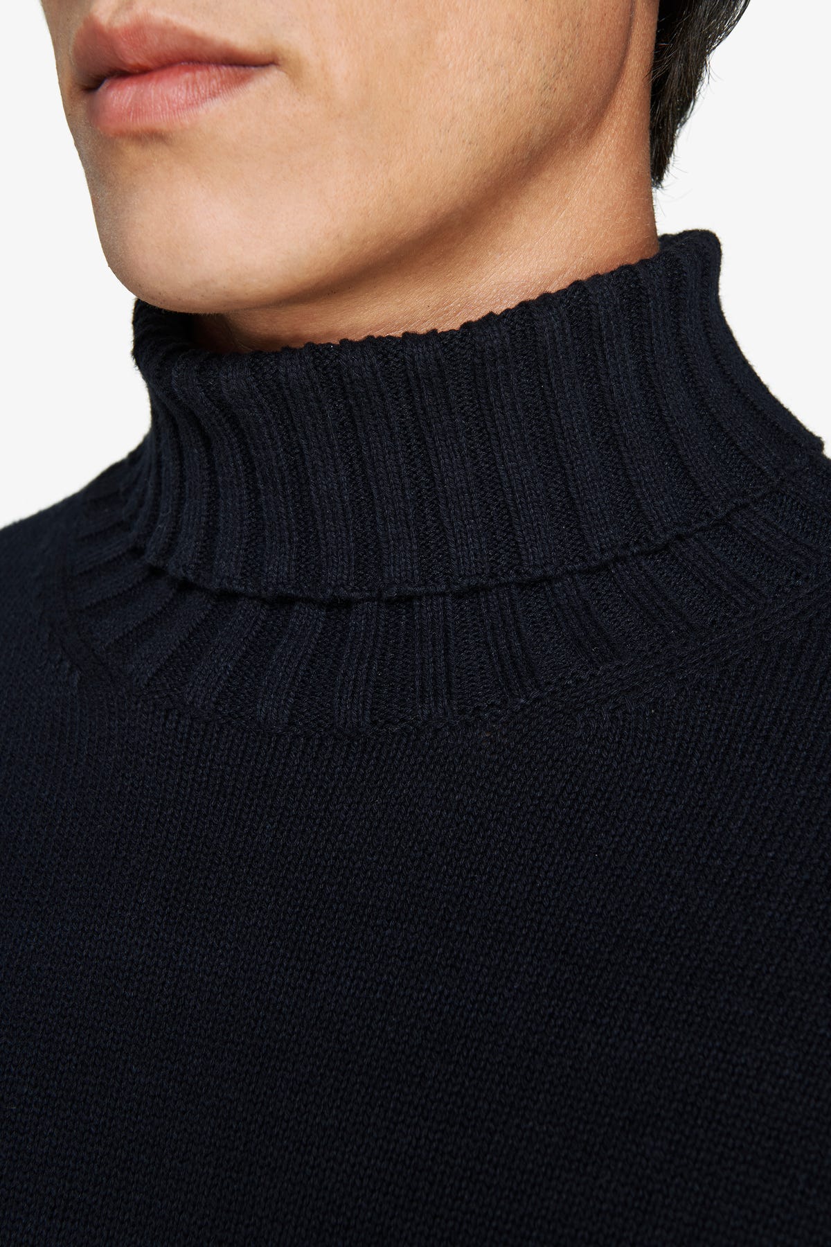 Blue stockinette-knit turtleneck