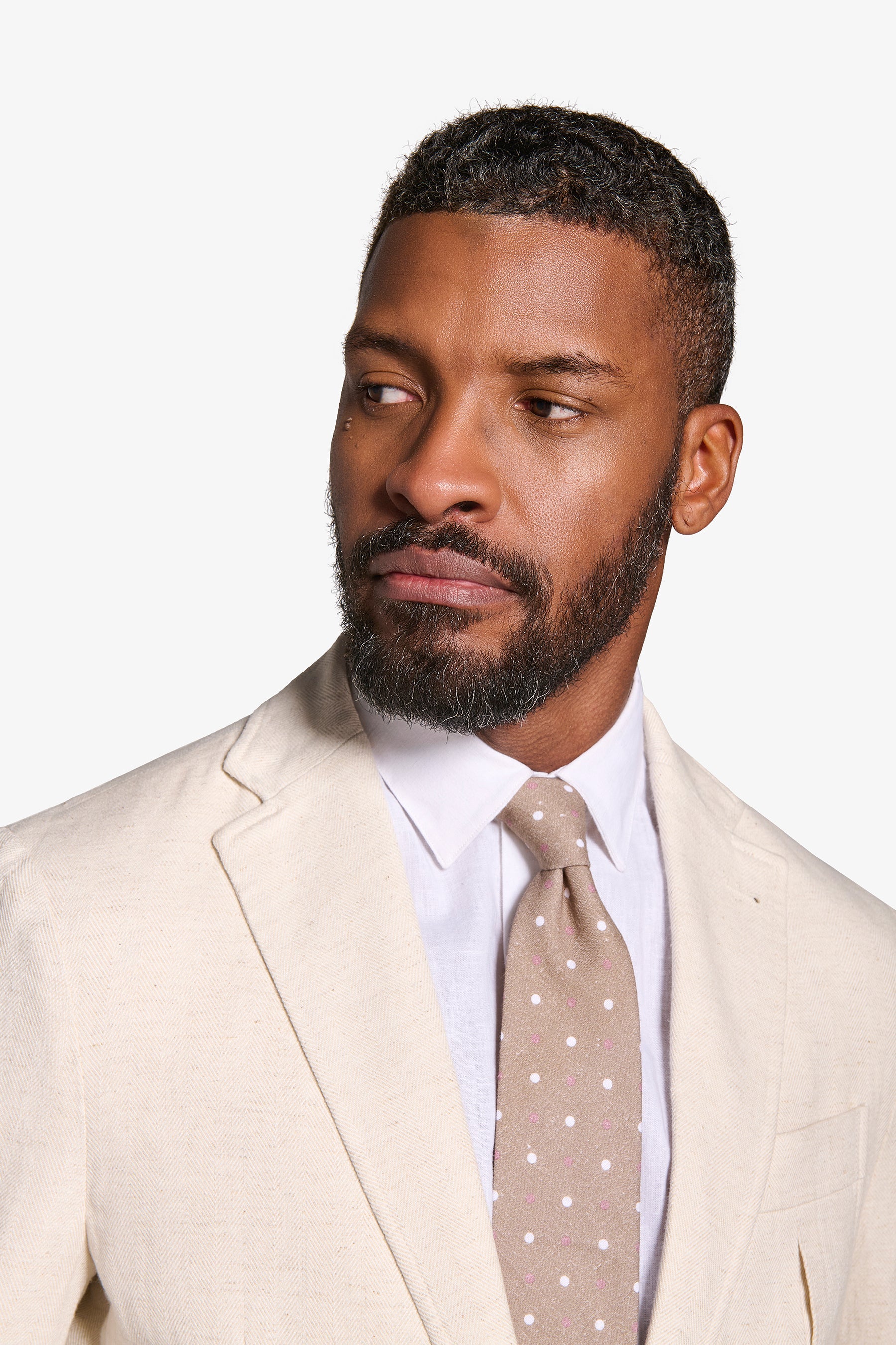 Giacca spigata sabbia-Dan John