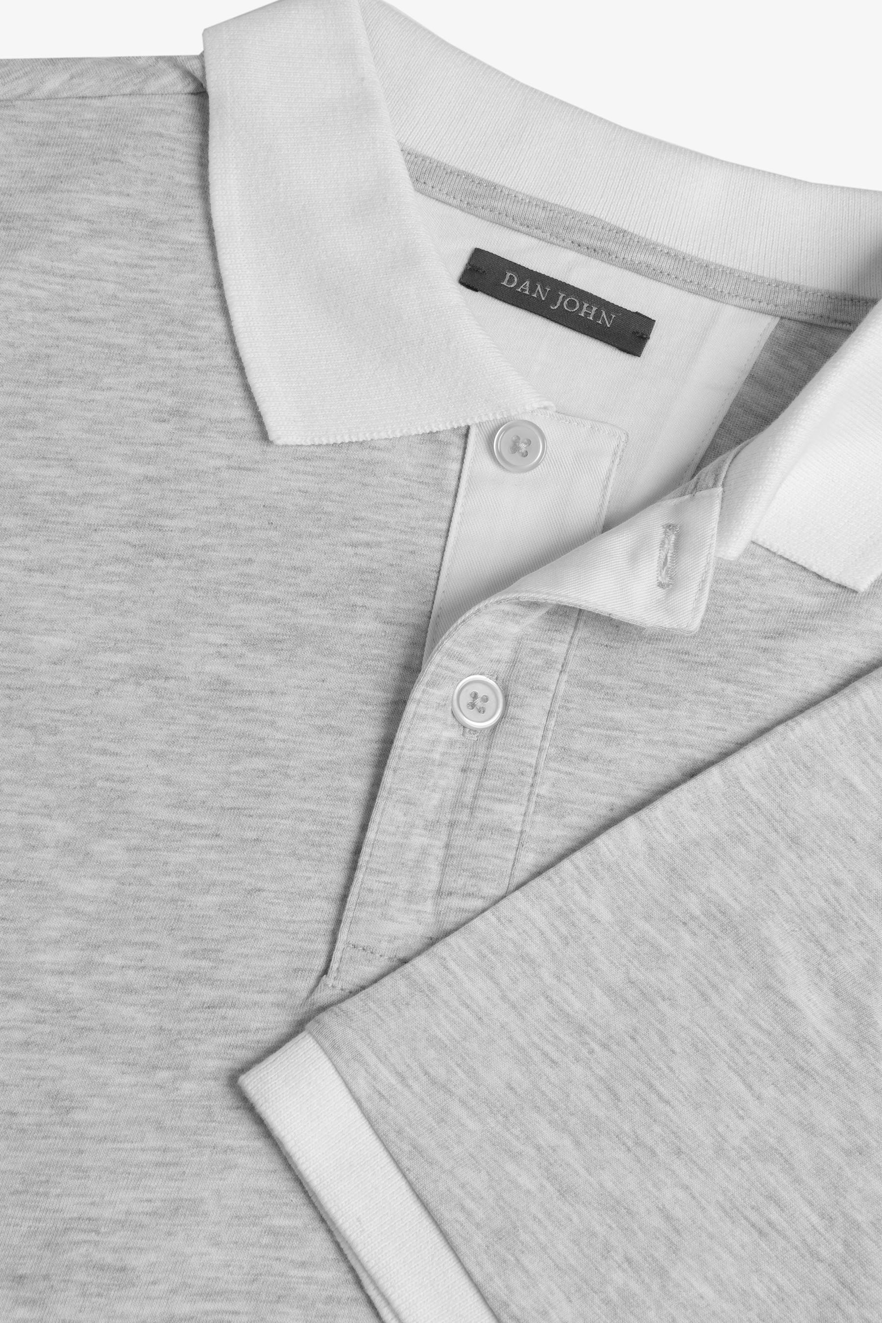 Polo in jersey con contrasti polvere-Dan John