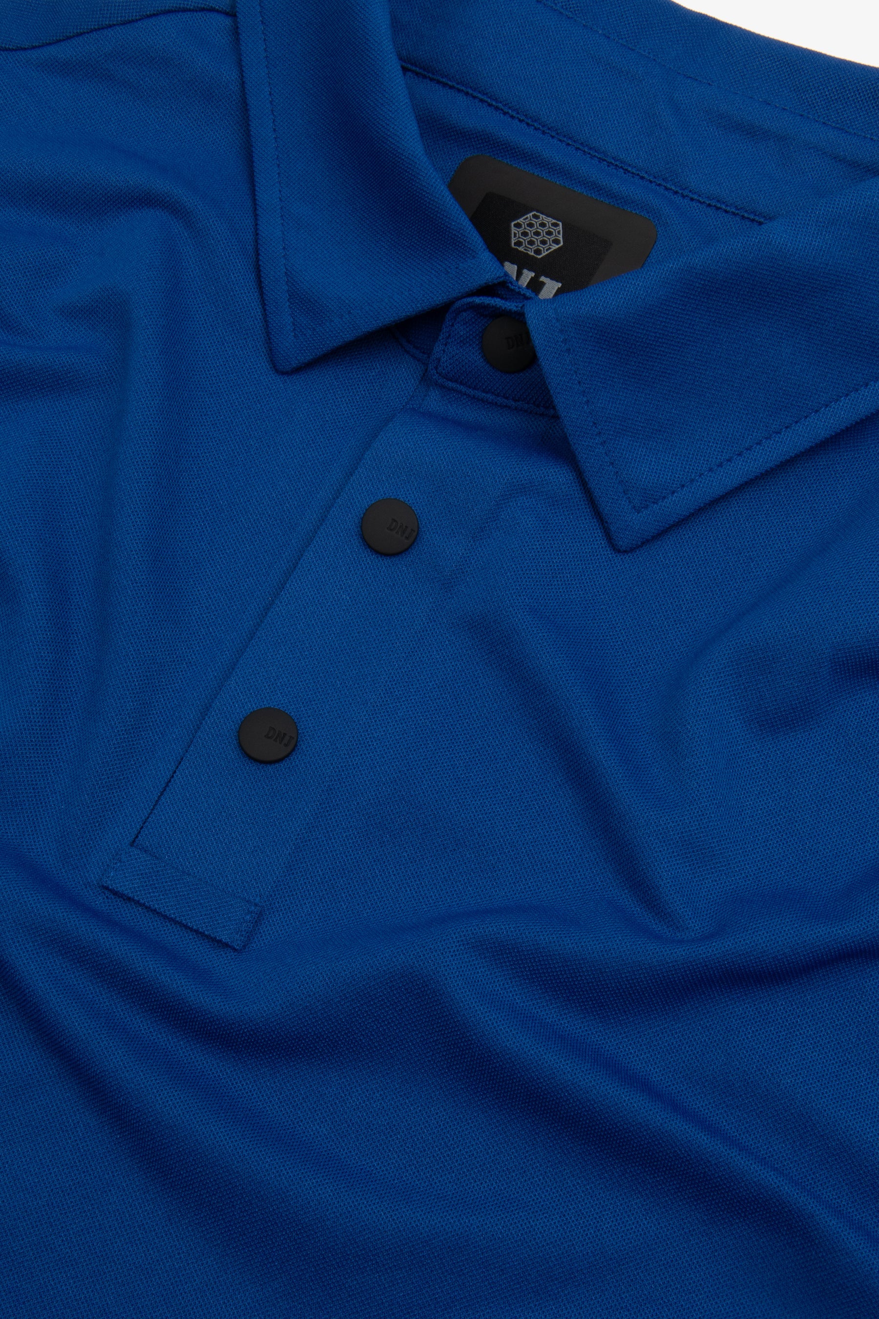 Polo tecnica con bottoni royal DNJ-Dan John