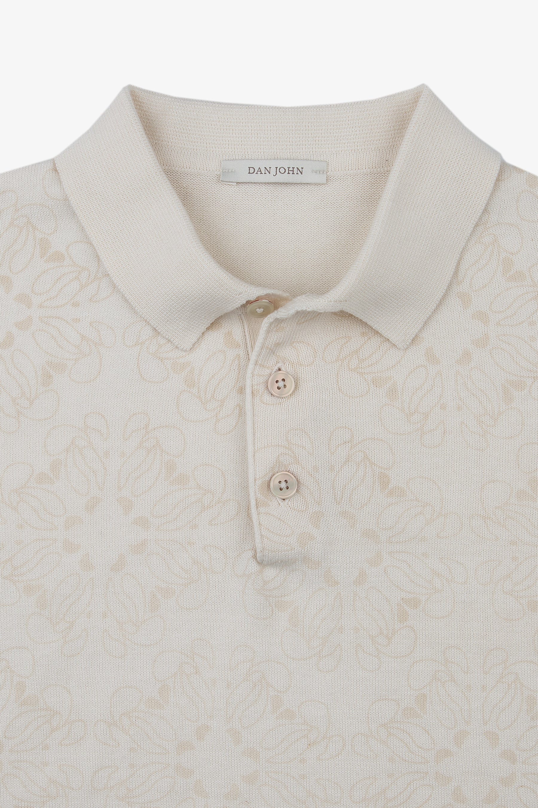 Polo con estampado floral color arena