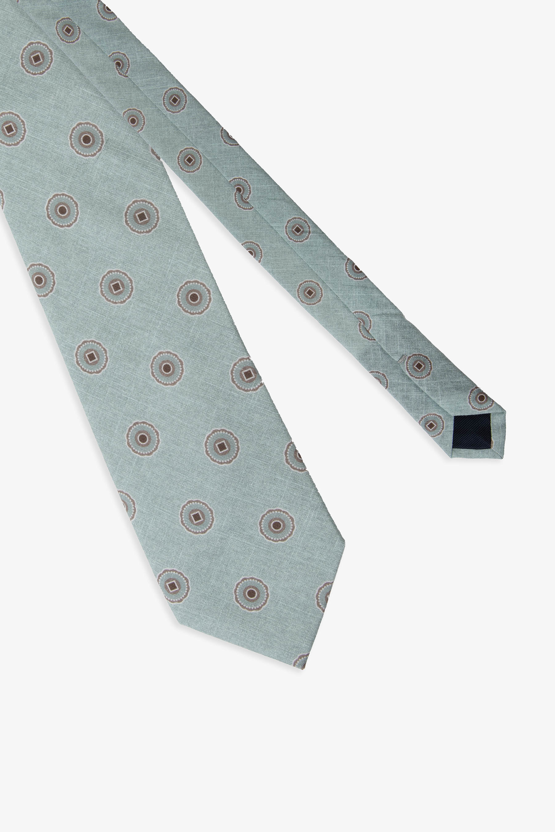 Corbata herringbone con estampado de círculos salvia