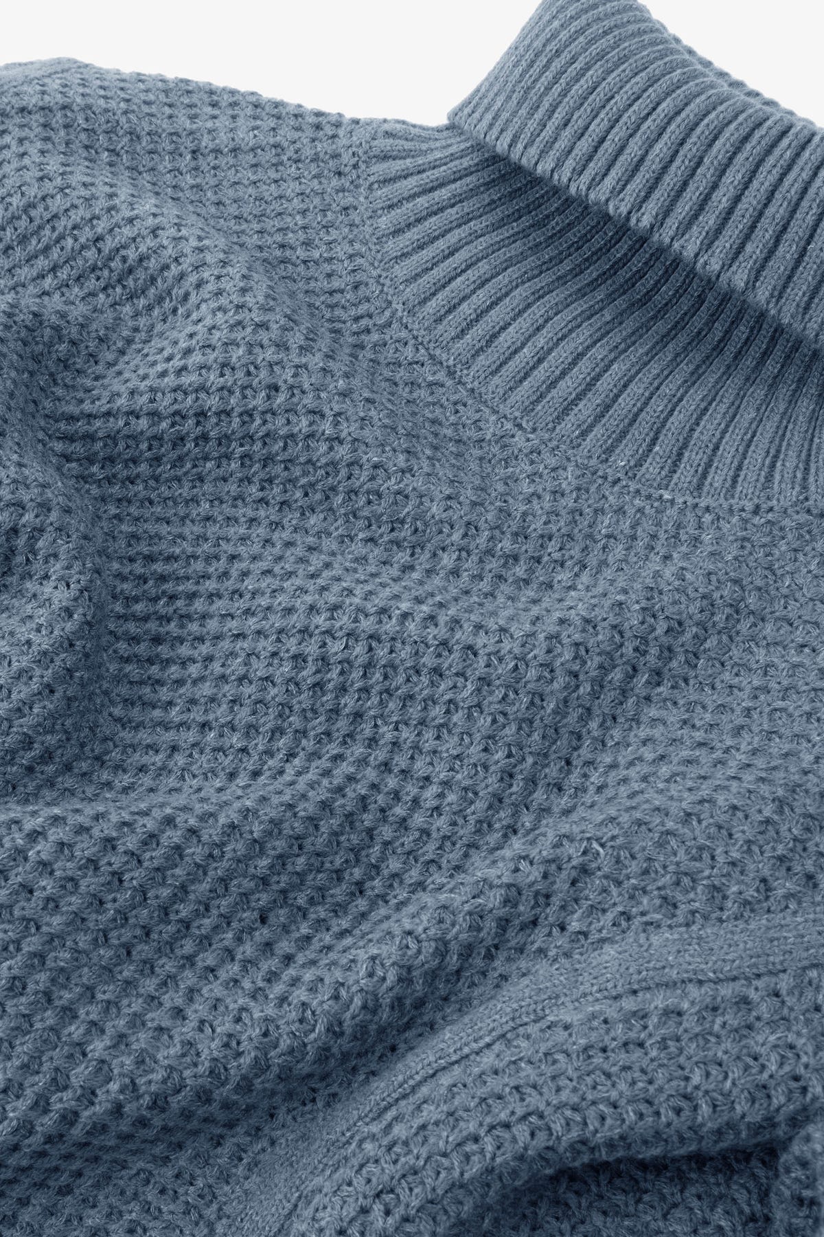 Maglia dolcevita punto canestro carta da zucchero