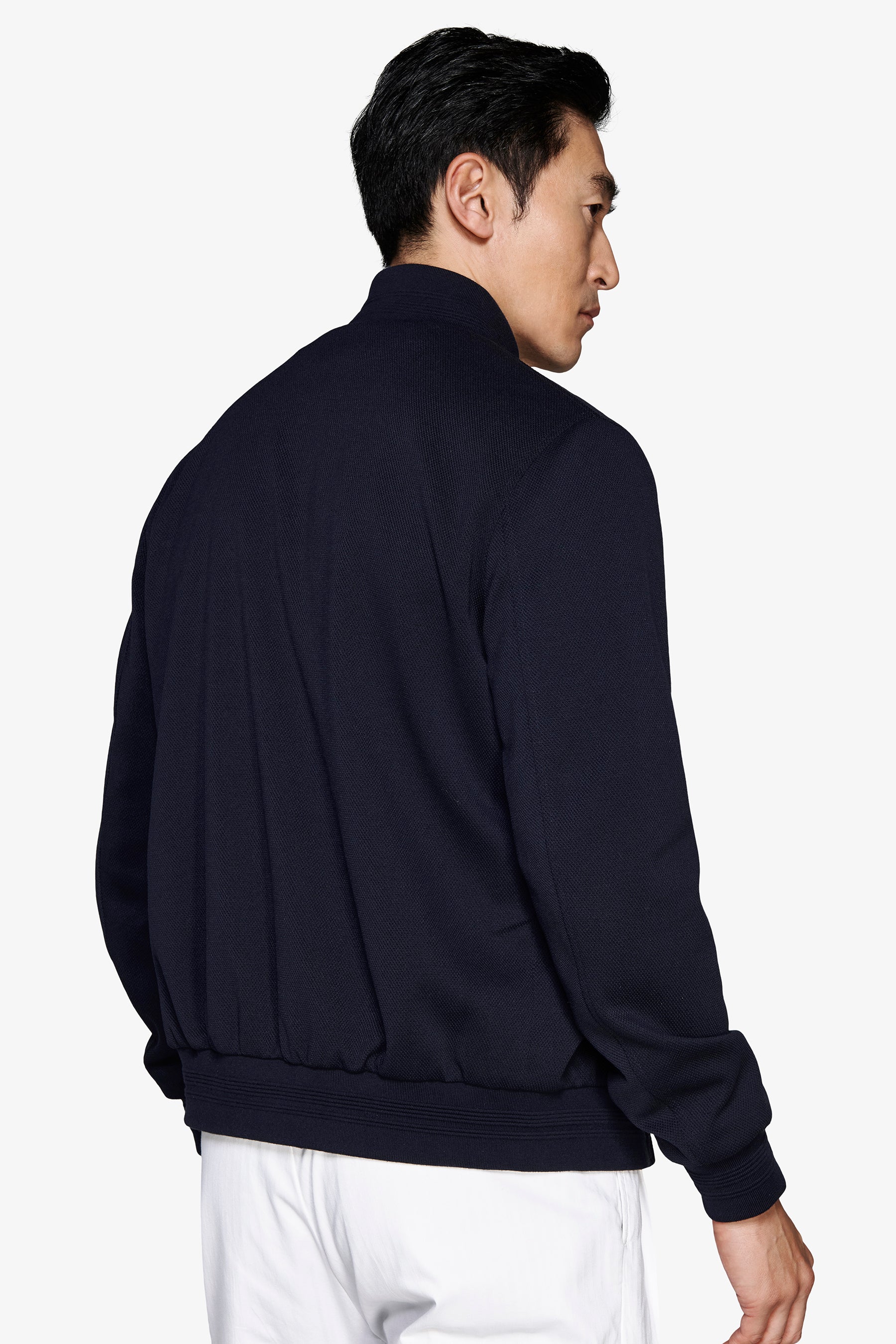 Chaqueta bómber en punto piqué.