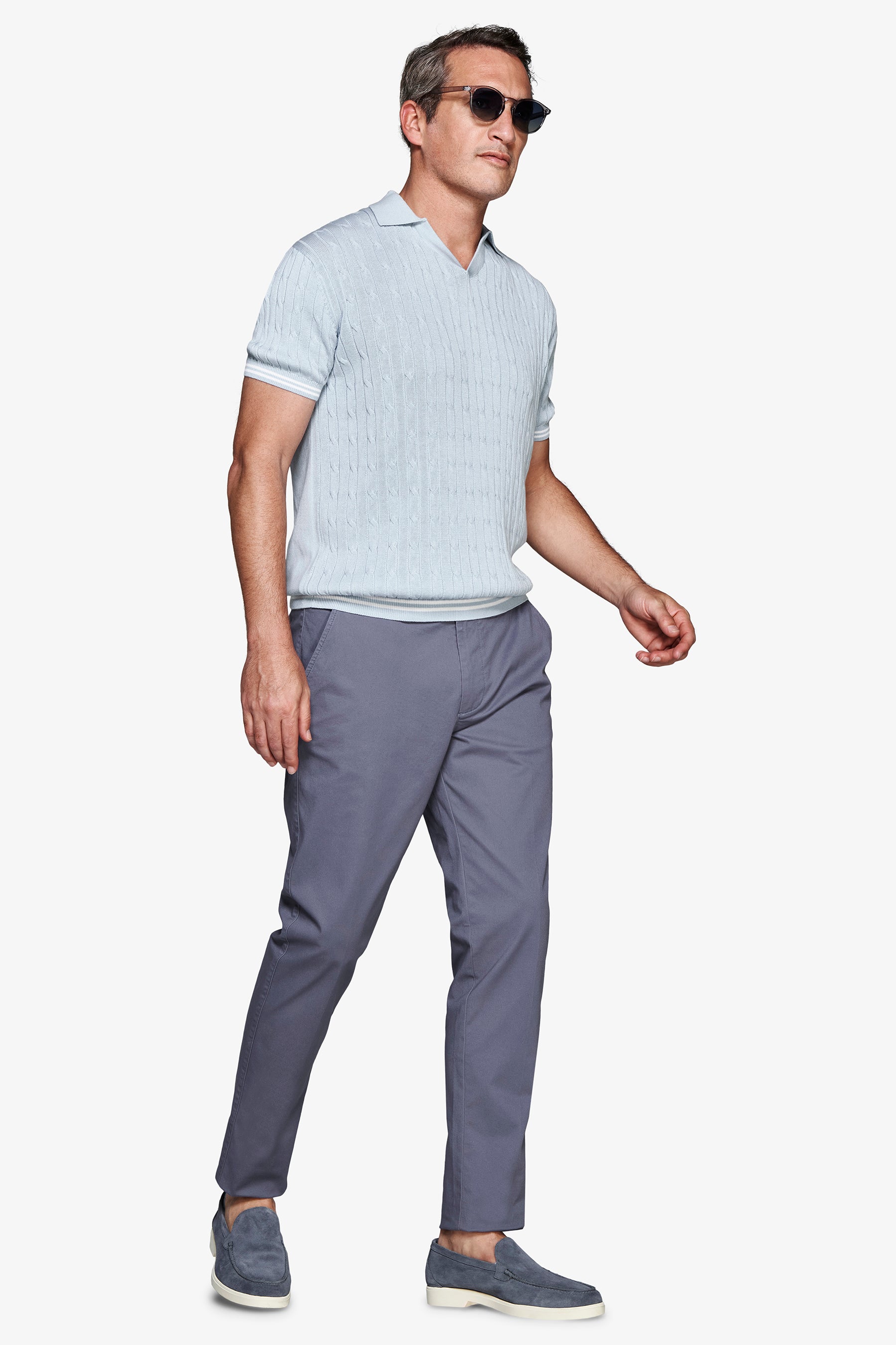Polo in maglia treccia celeste