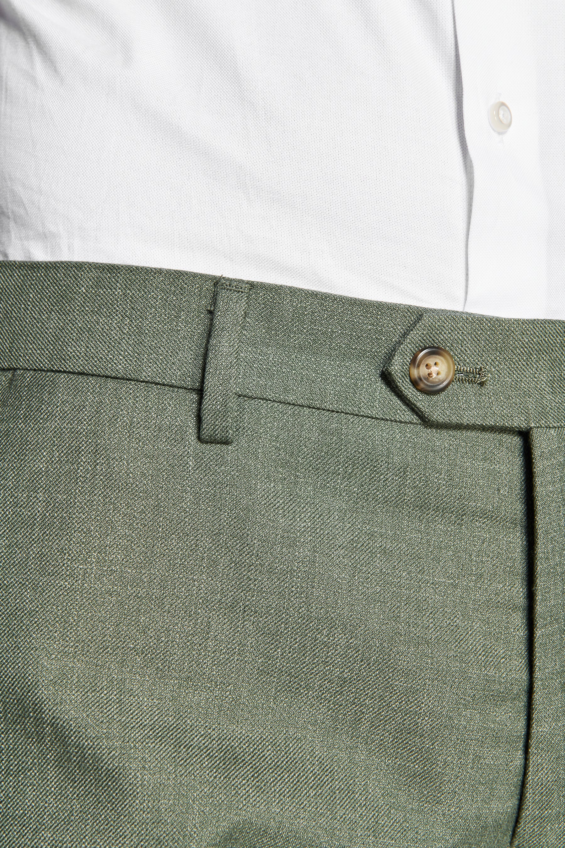 Pantalón de tela verde flameada