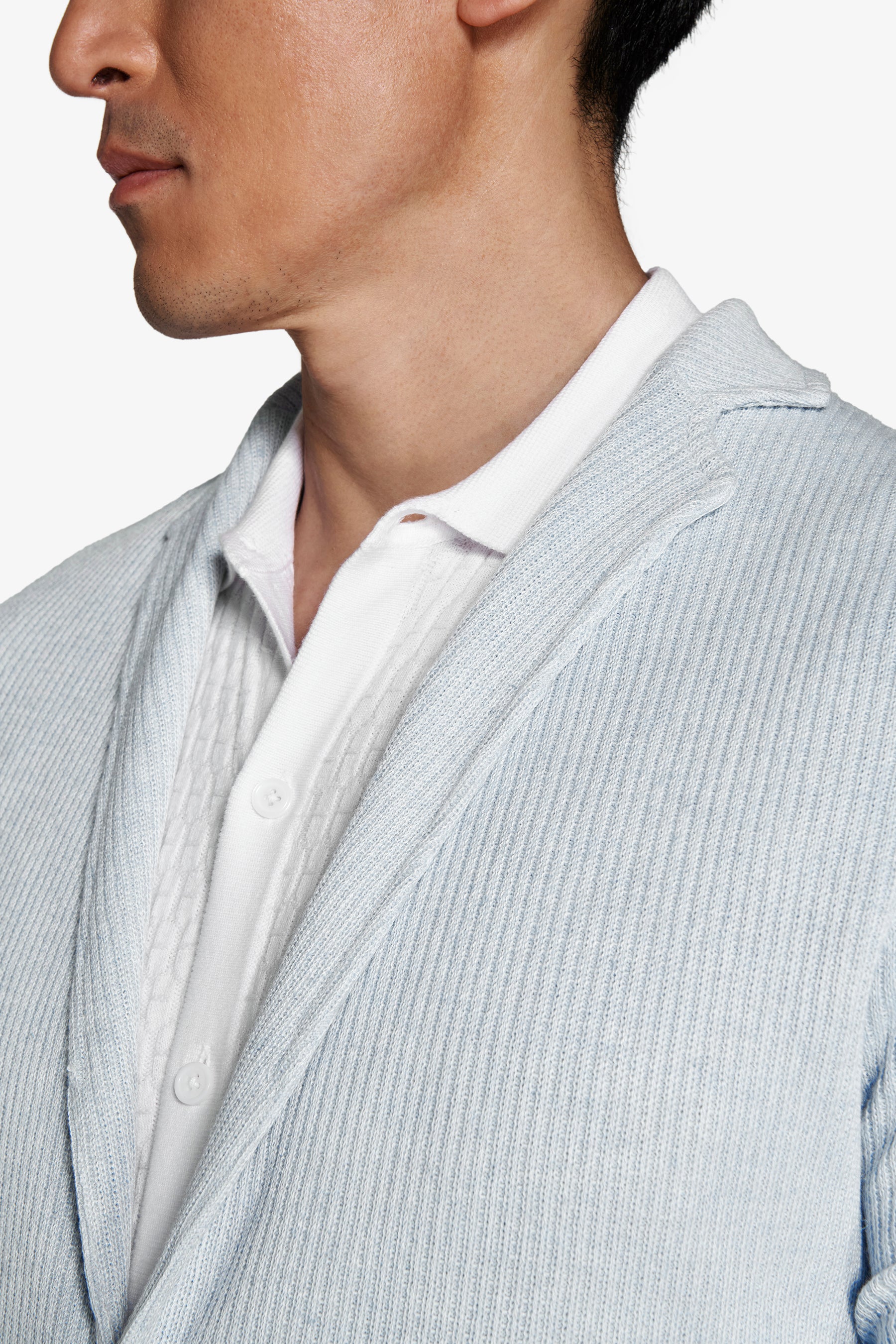 Americana de punto canalé inglés celeste