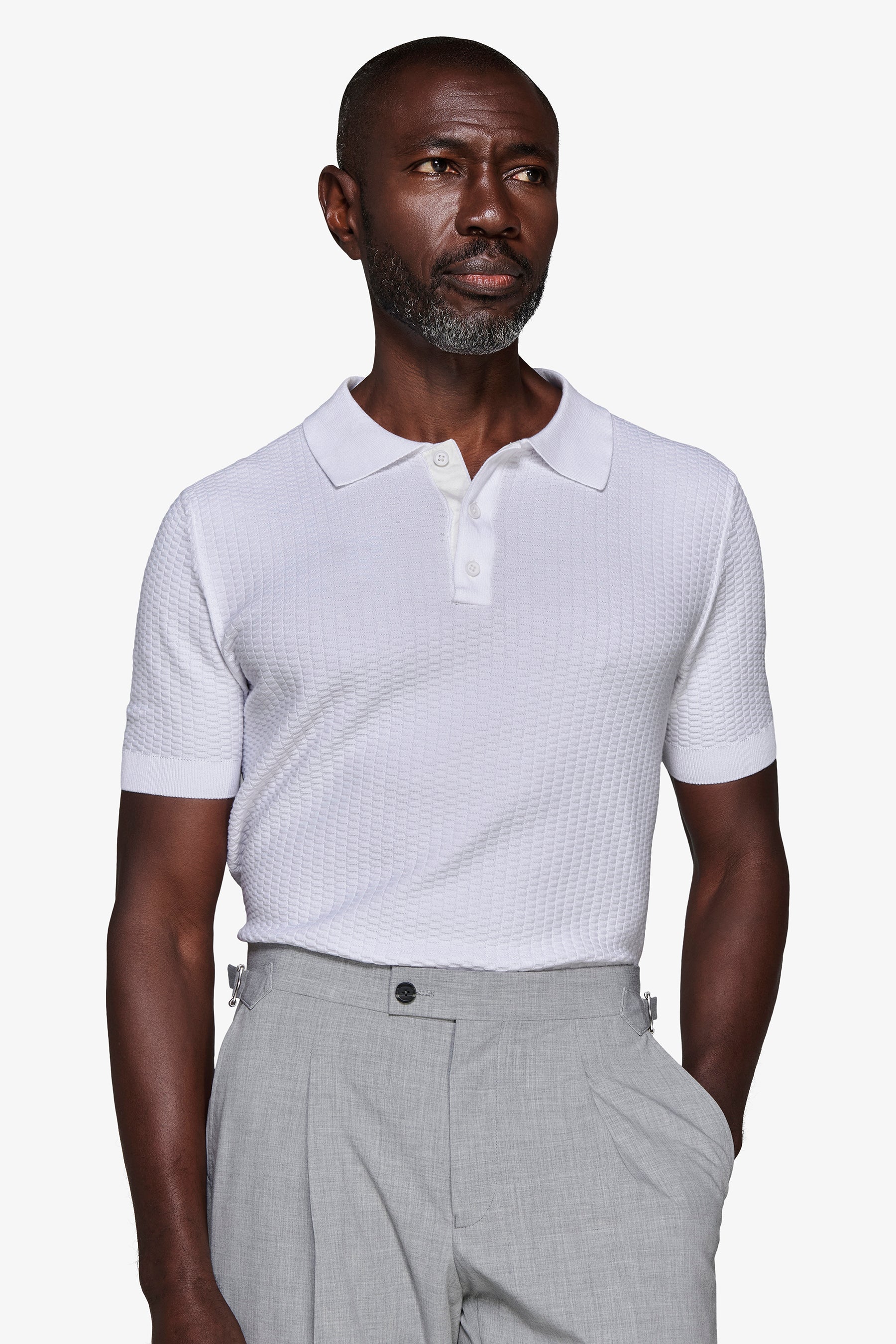 Polo in maglia punto dadino bianca