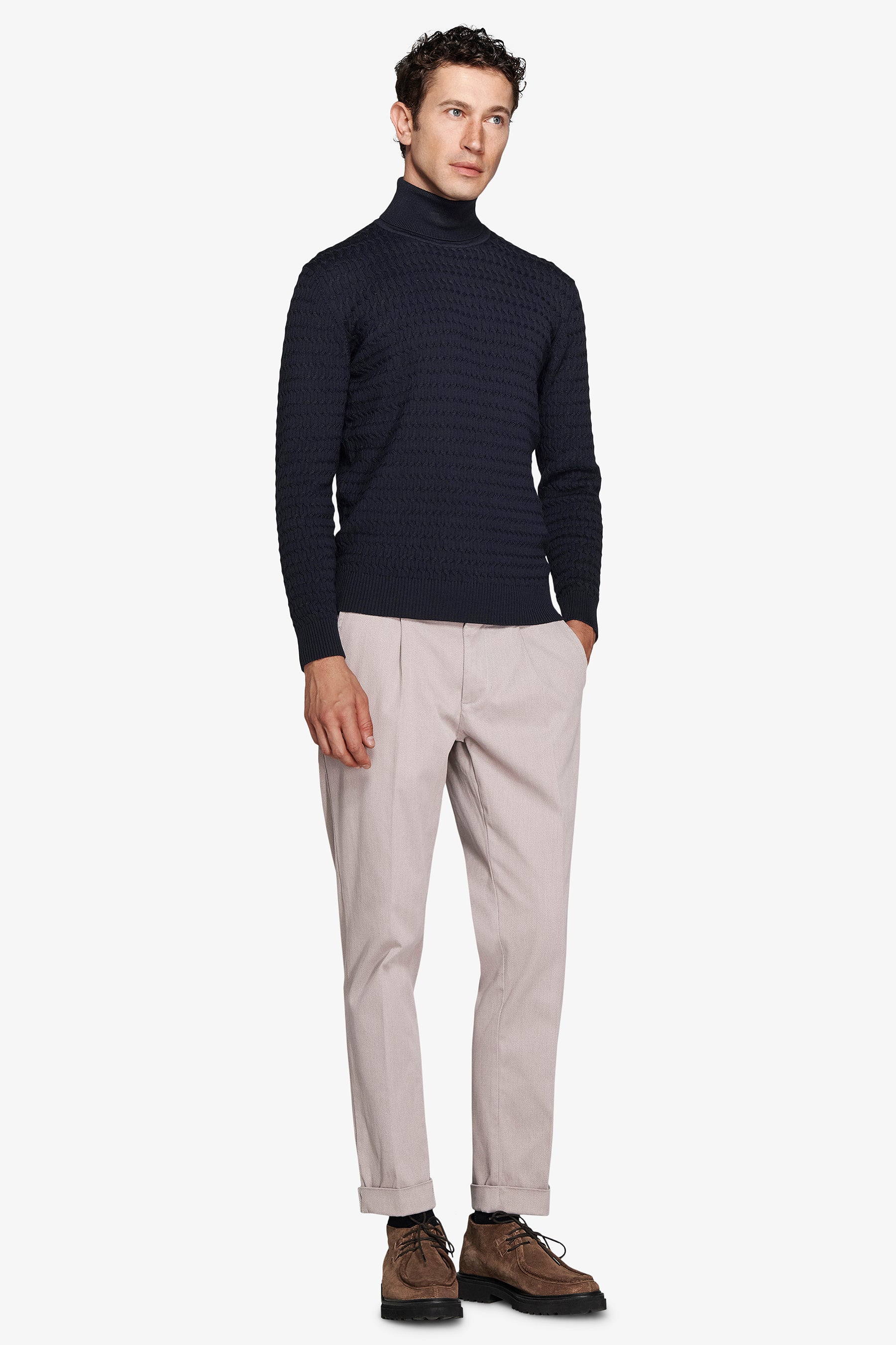 Blue cable knit turtleneck sweater