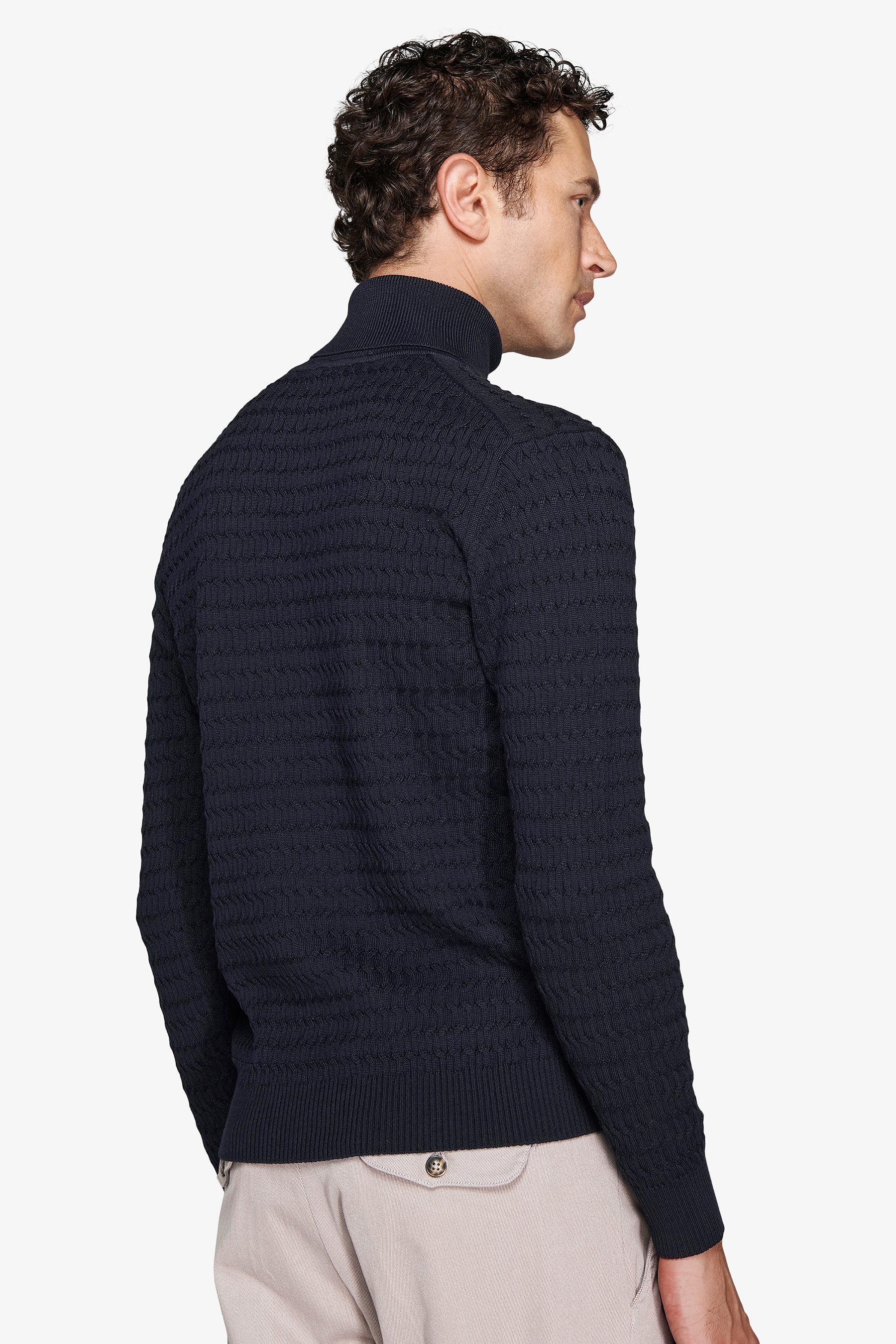 Blue cable knit turtleneck sweater