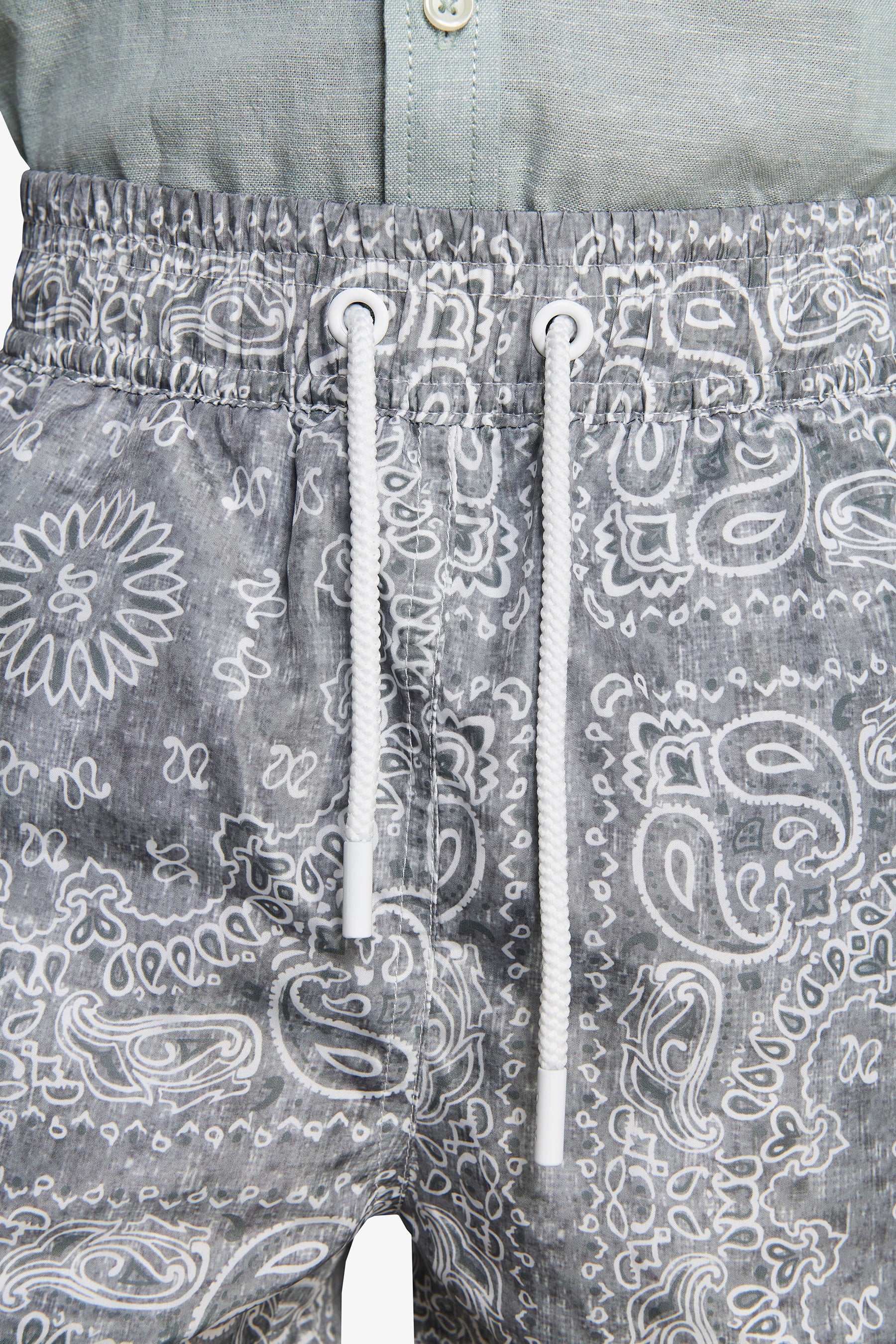 KIDS Sage floral print swim trunks