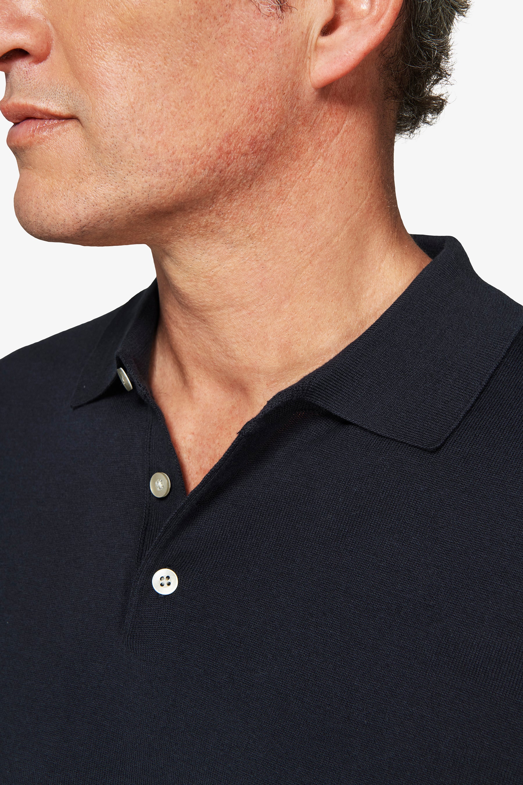 Poloshirt aus blauem Strick