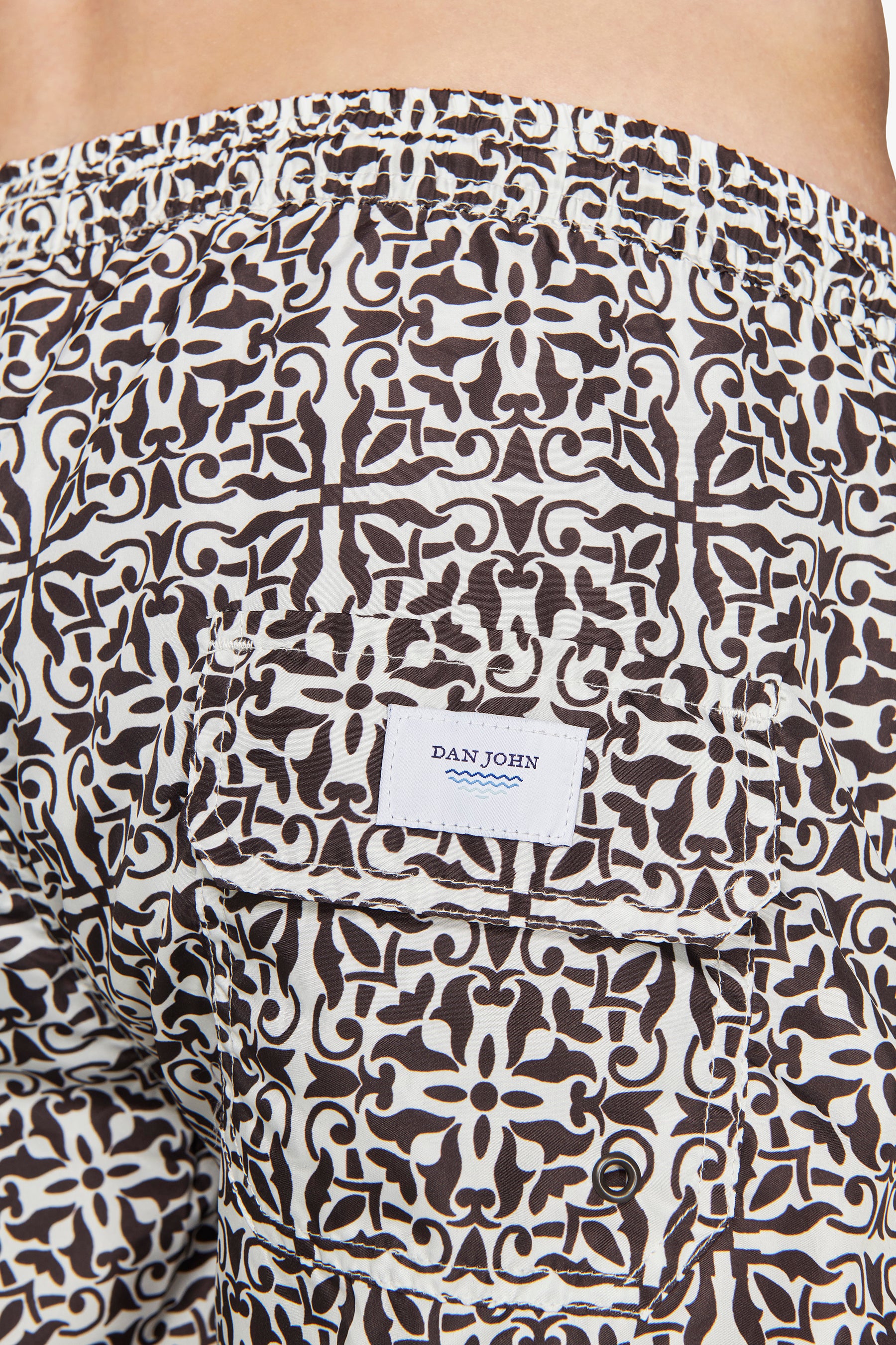 Dark brown ethnic print swim trunks