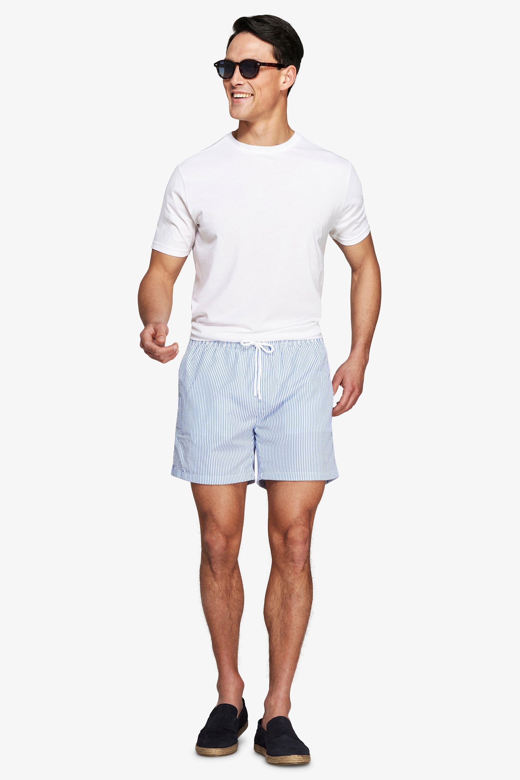 Light blue seersucker striped swim trunks