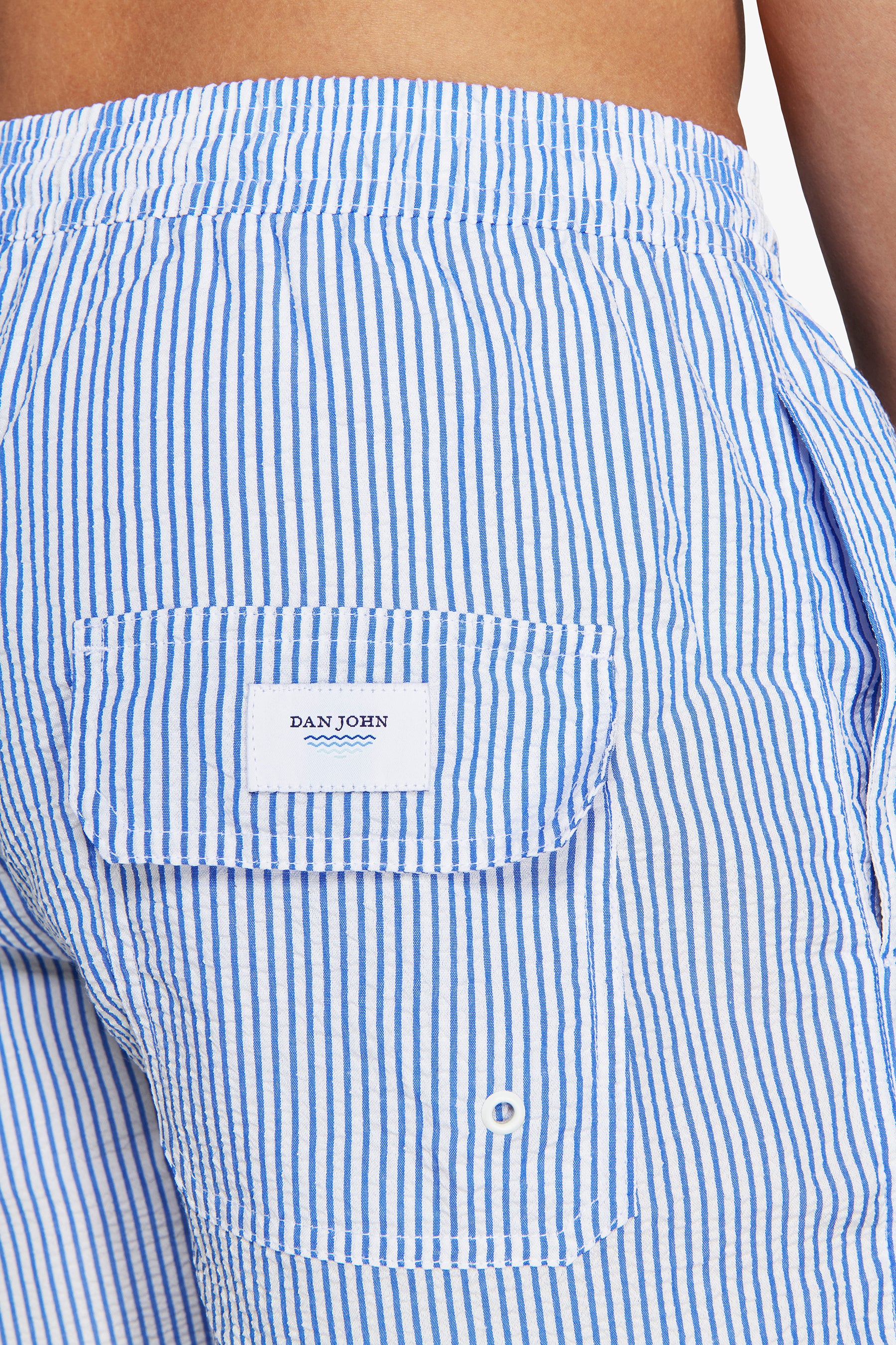 Light blue seersucker striped swim trunks