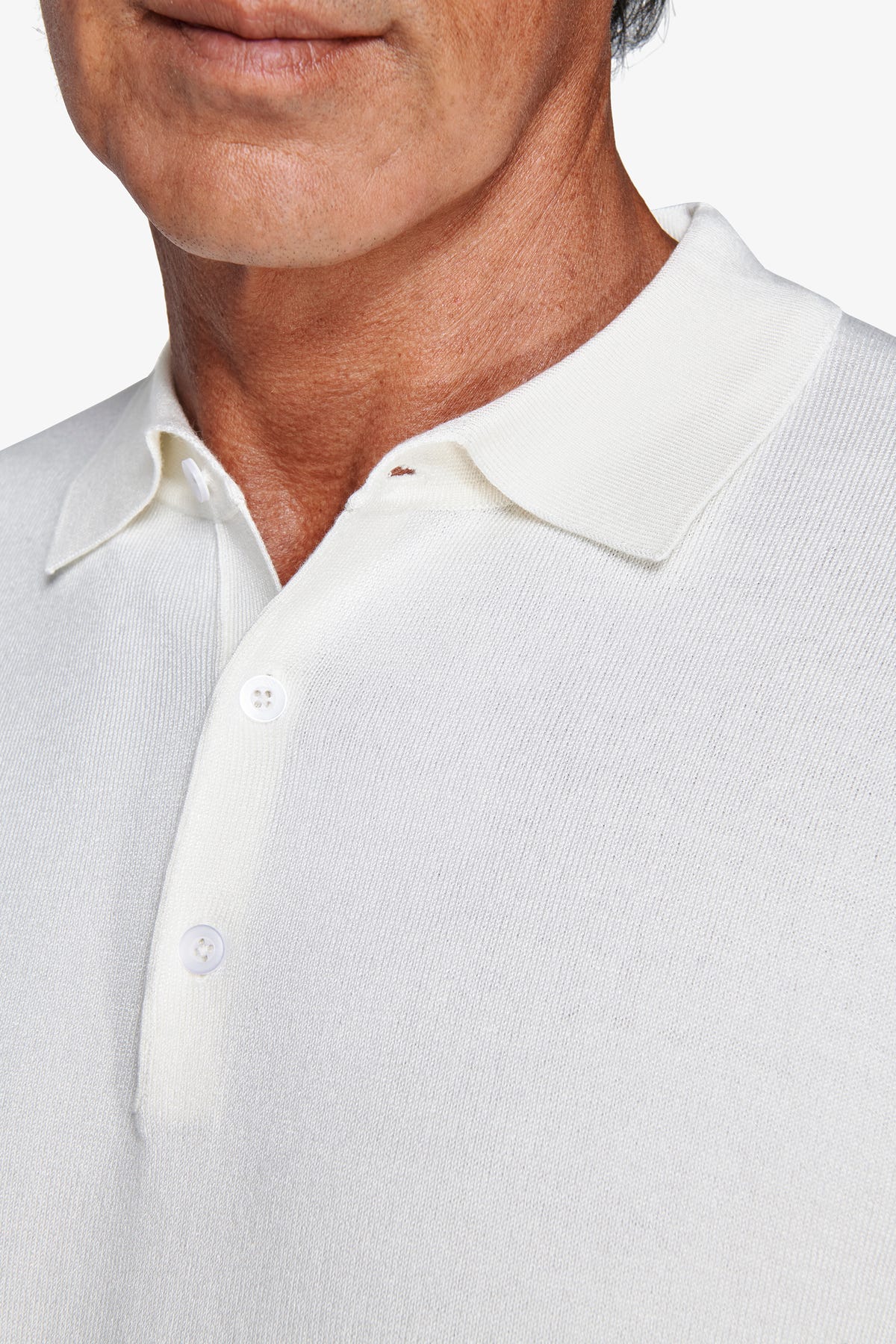 Polo in maglia con bottoni panna