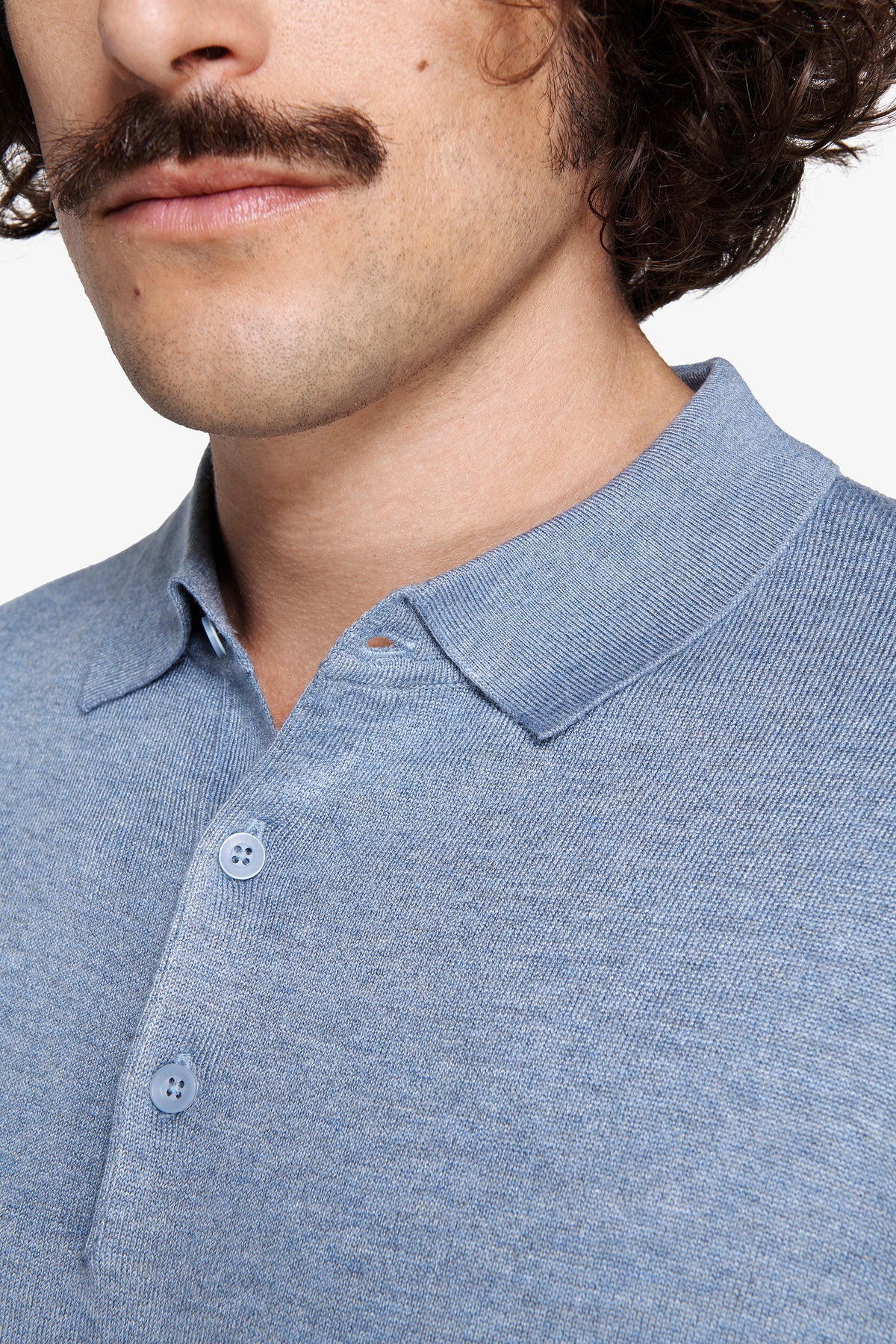 Polo in maglia con bottoni celeste