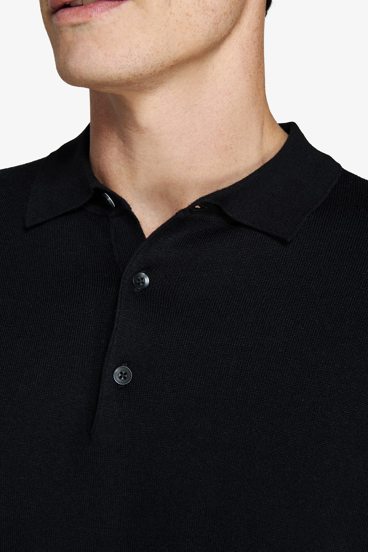 Black knitted polo shirt with buttons