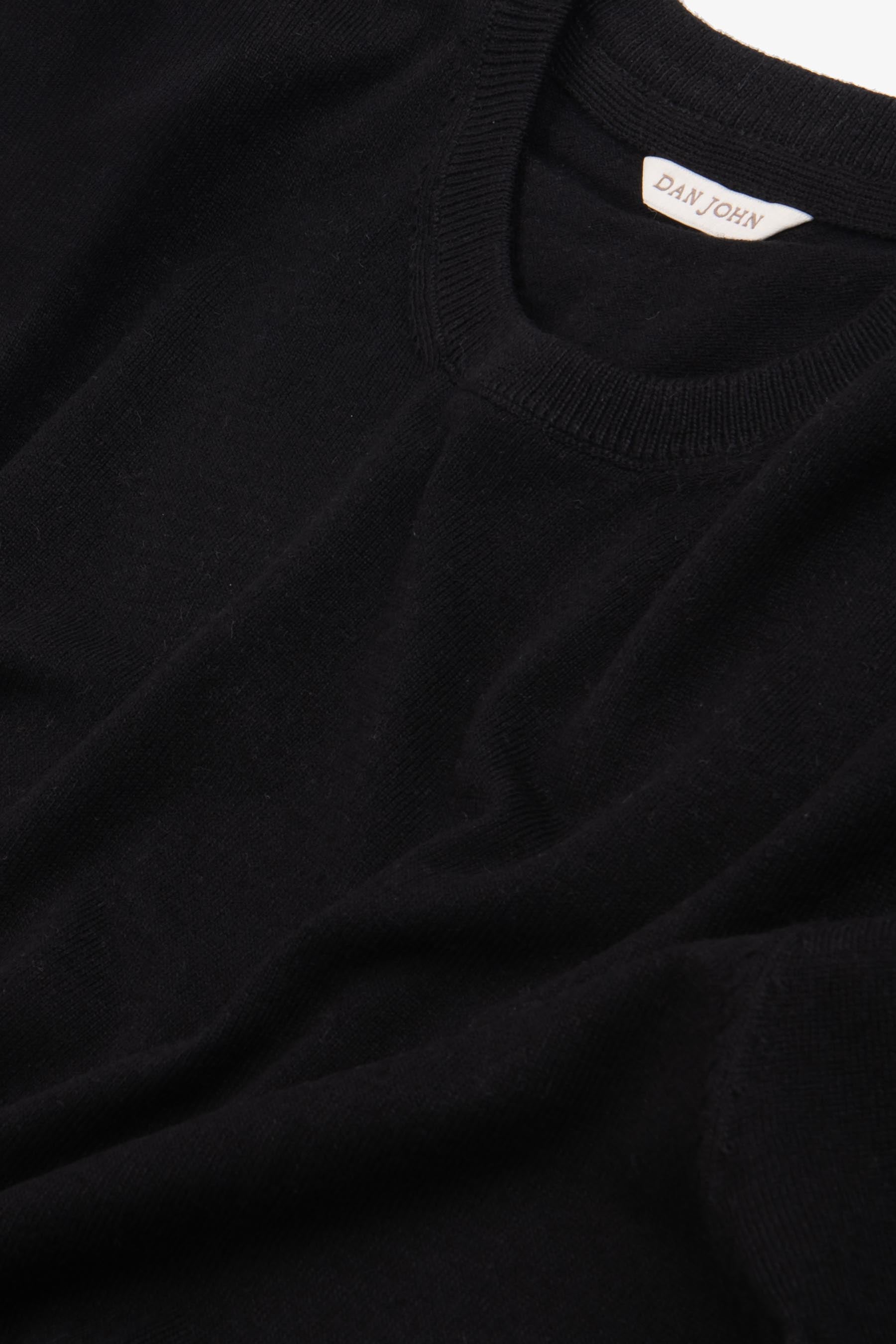 T-shirt in maglia melange nero-Dan John