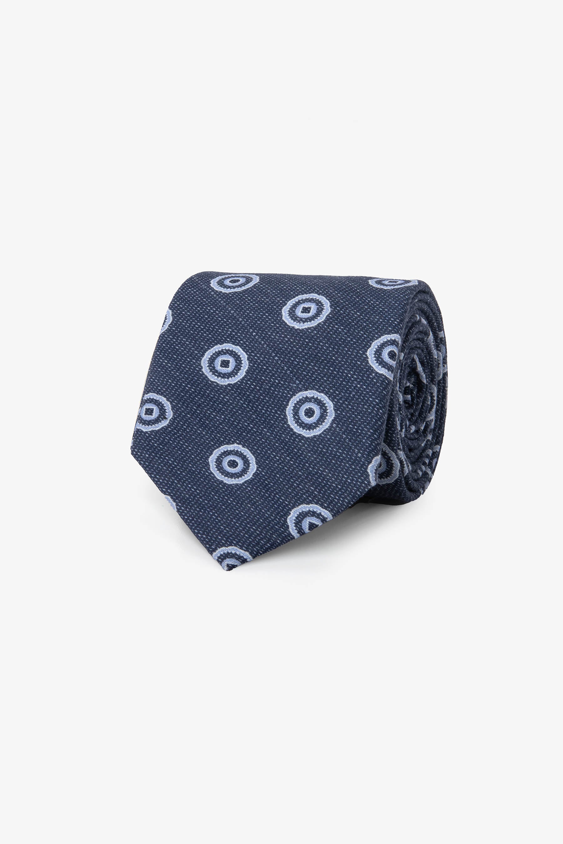 Corbata herringbone con estampado de círculos azul azafata